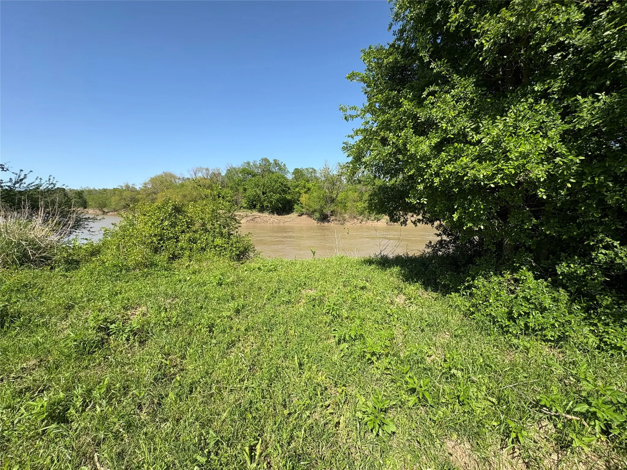 Ten acres in gated River Point provide space, privacy, and room to build.