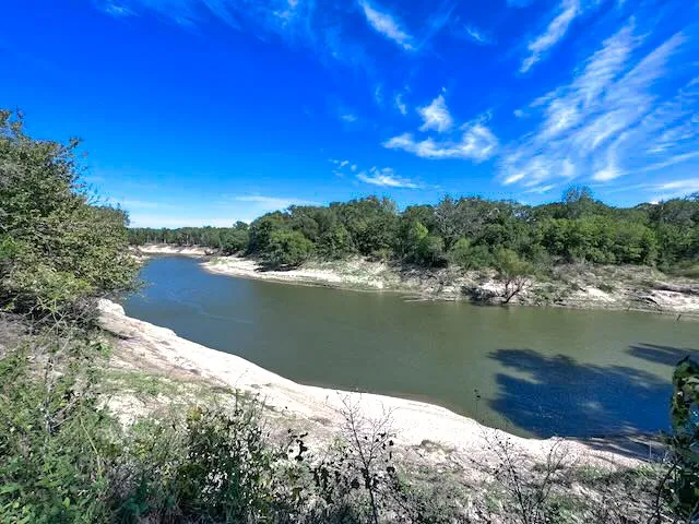 A quiet East Texas escape with river views, acreage, and endless potential.