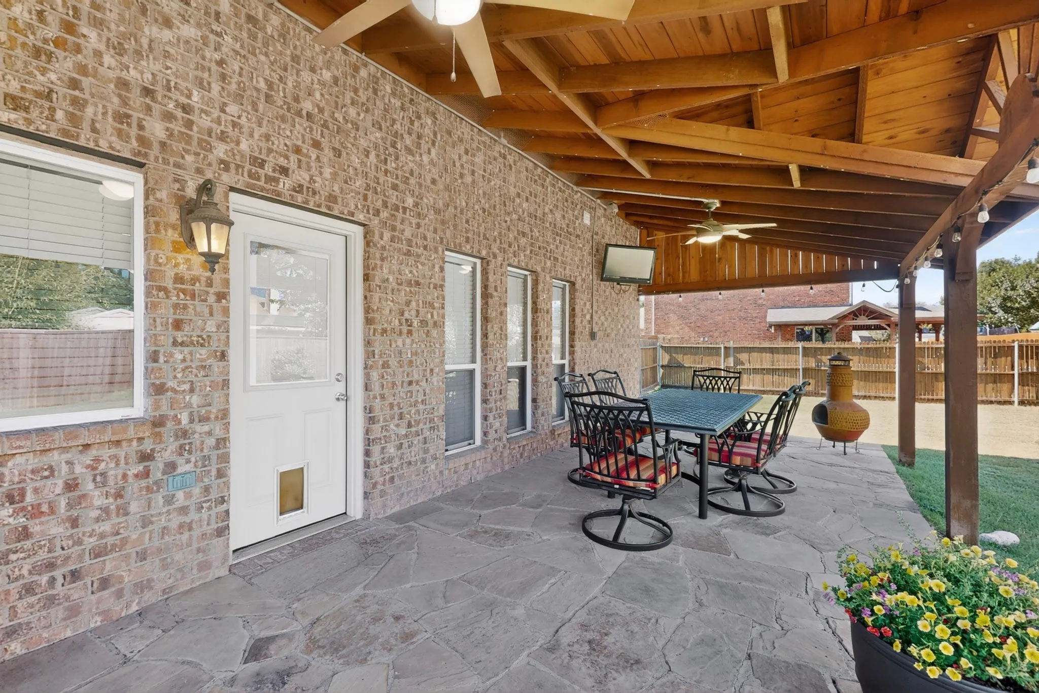 The patio furniture and TV conveys with the home!