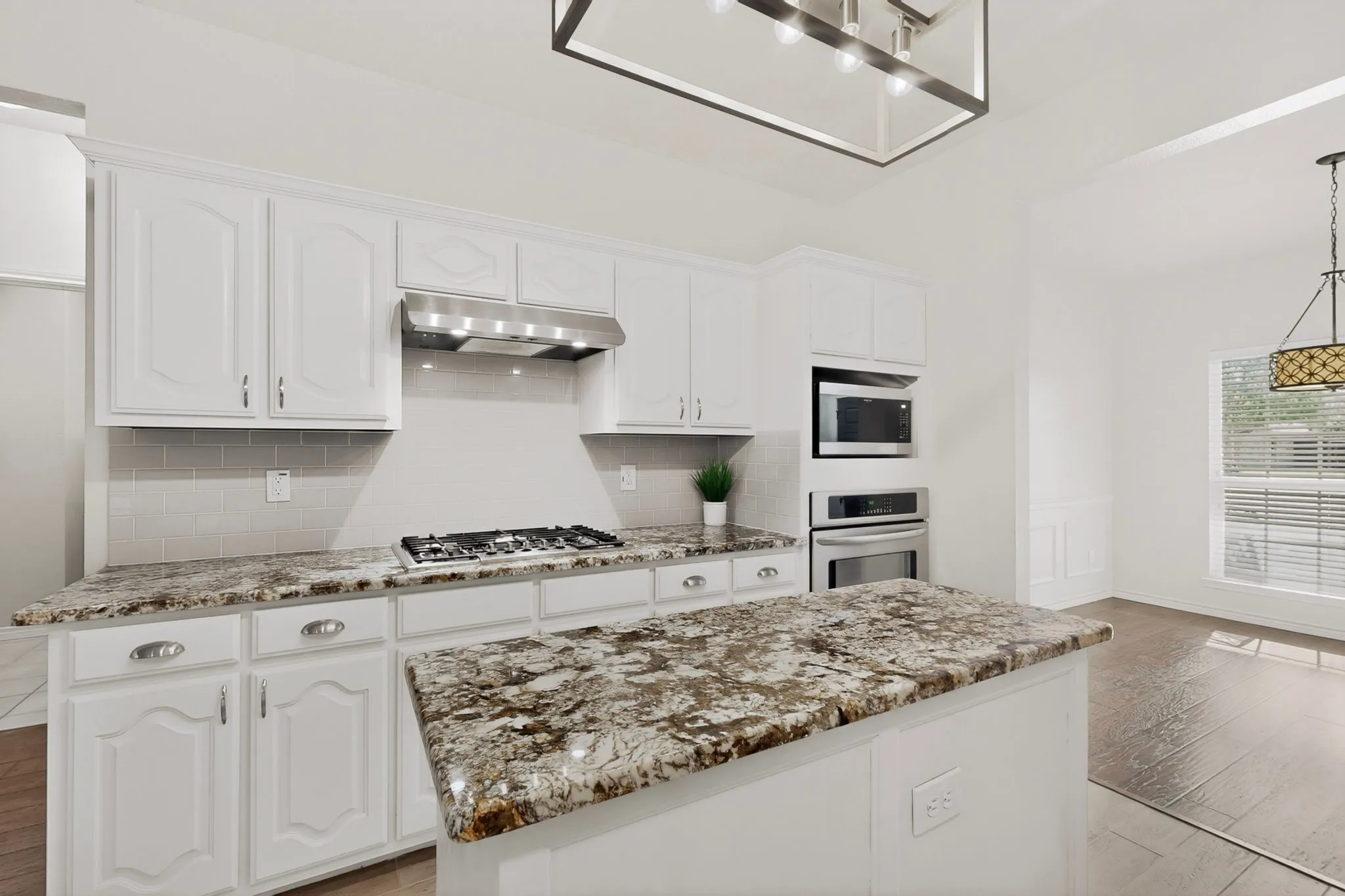 Enjoy cooking on the gas stove in this beautiful kitchen!