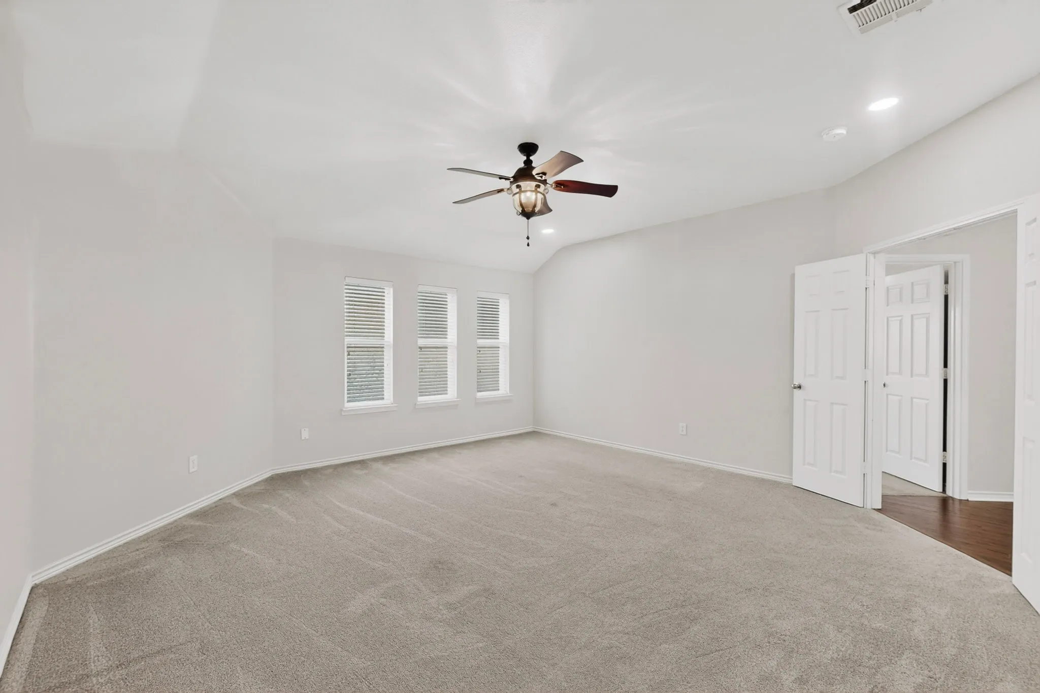 This spacious bonus room is great for a playroom, media room, game room, or even a workout room!