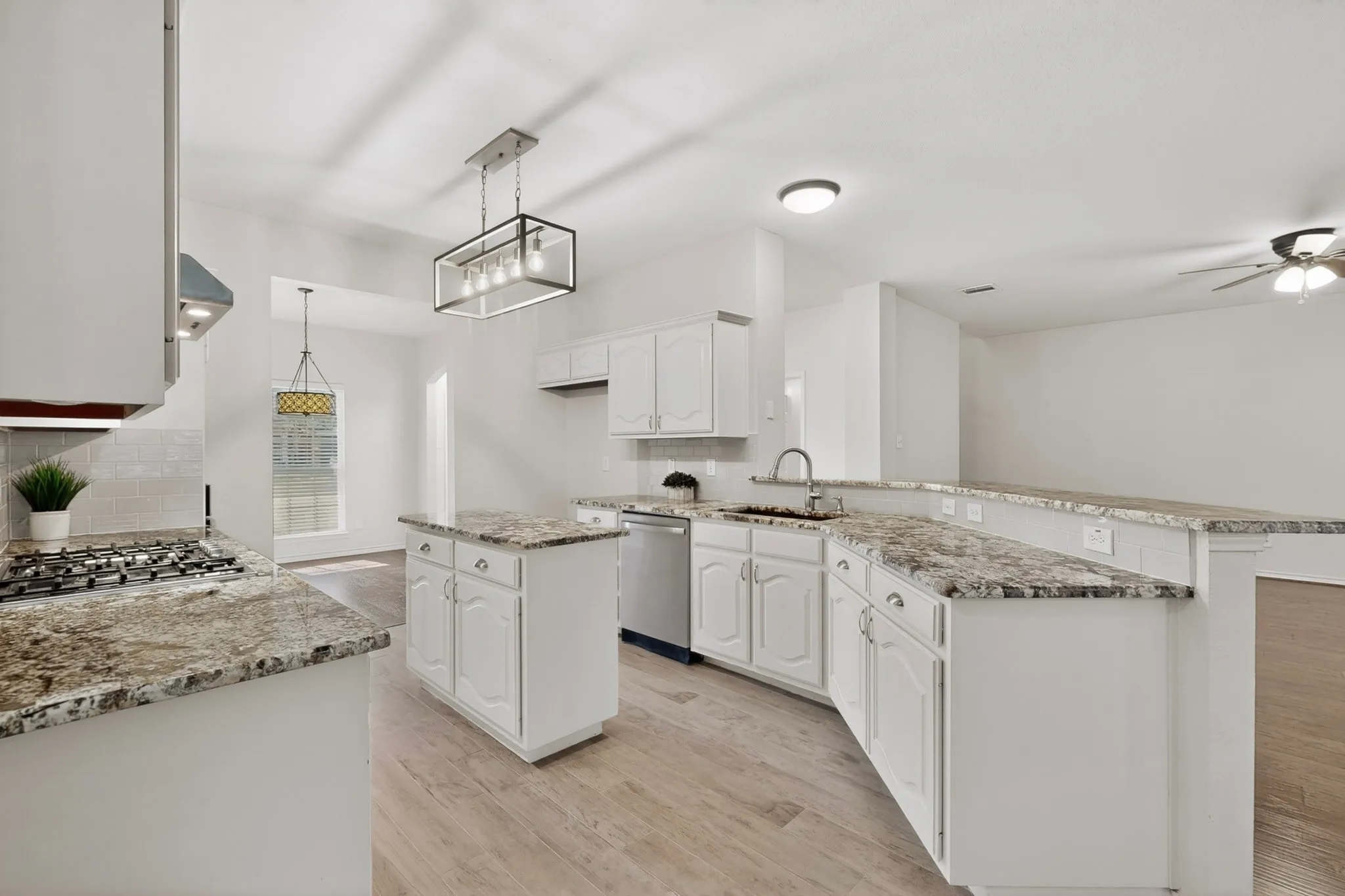 Beautiful granite countertops highlight this updated kitchen.