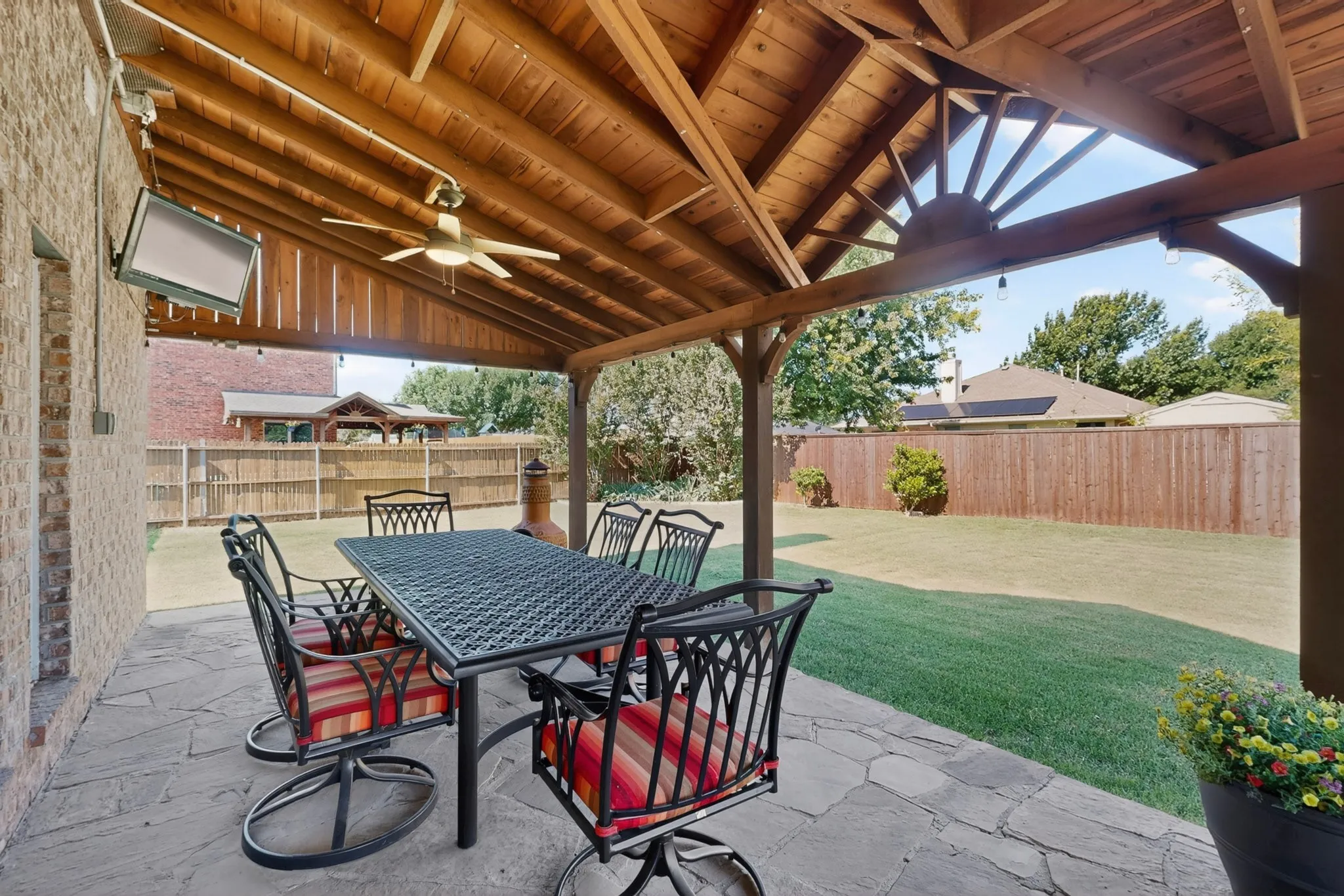 Large covered patio overlooking the large backyard!