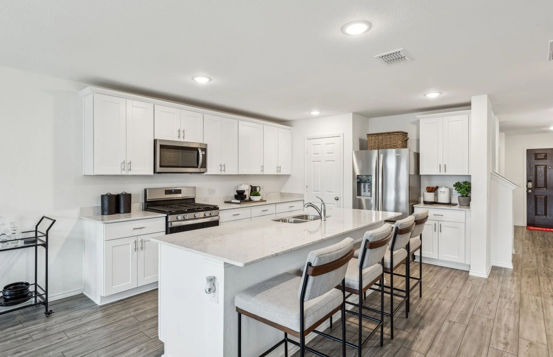 *Model Representation - Spacious kitchen with eat-in bartop island