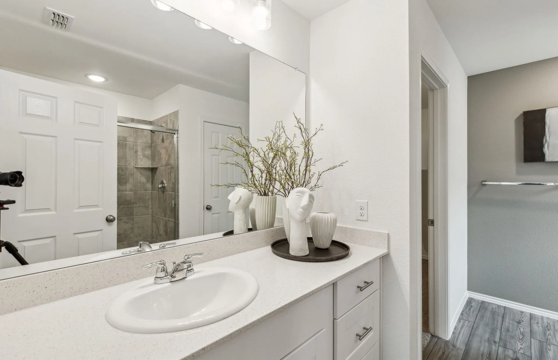 *Model Representation - Owner's suite bath with a large vanity