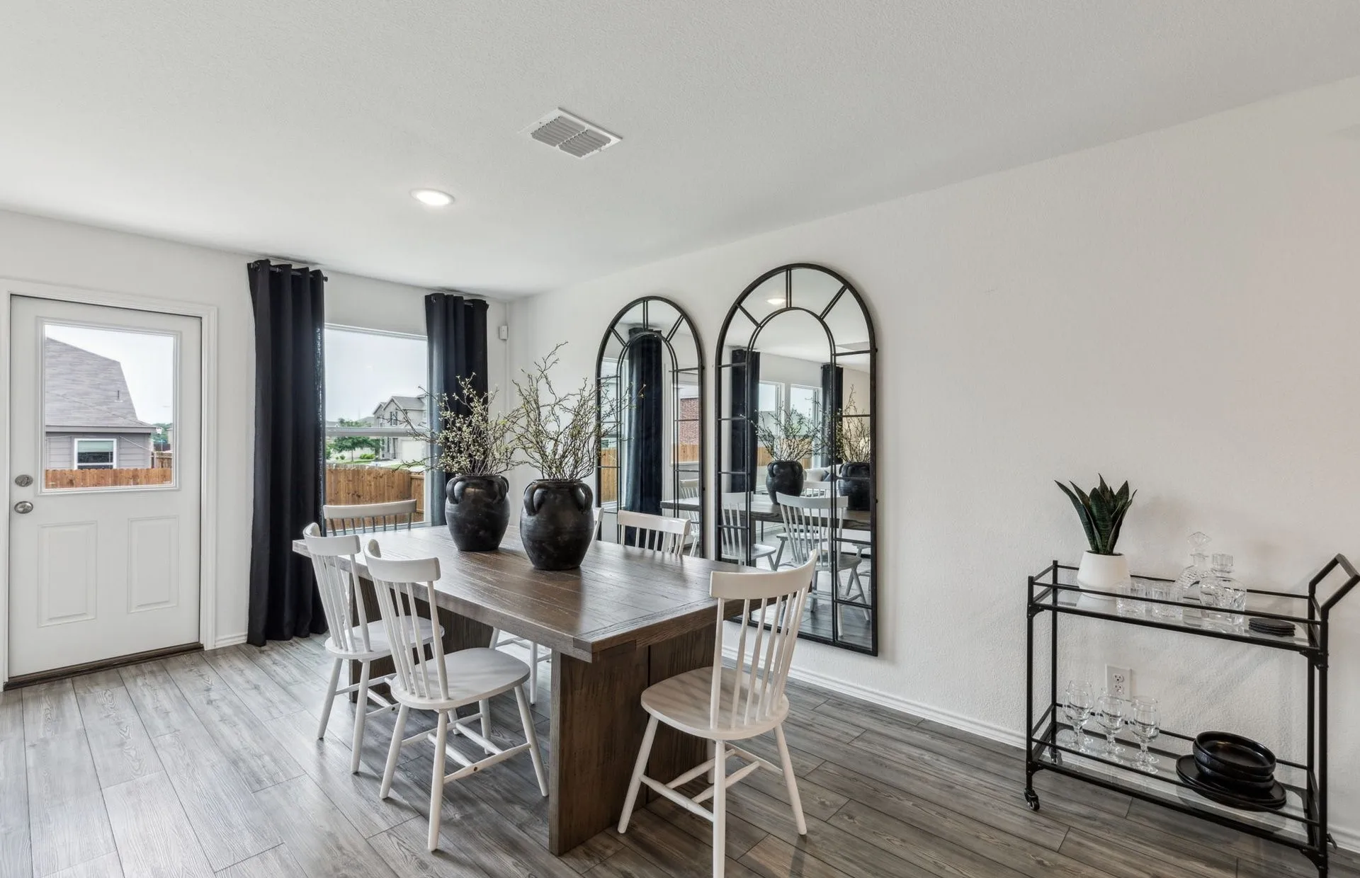 *Model Representation - Dining area off kitchen with large windows