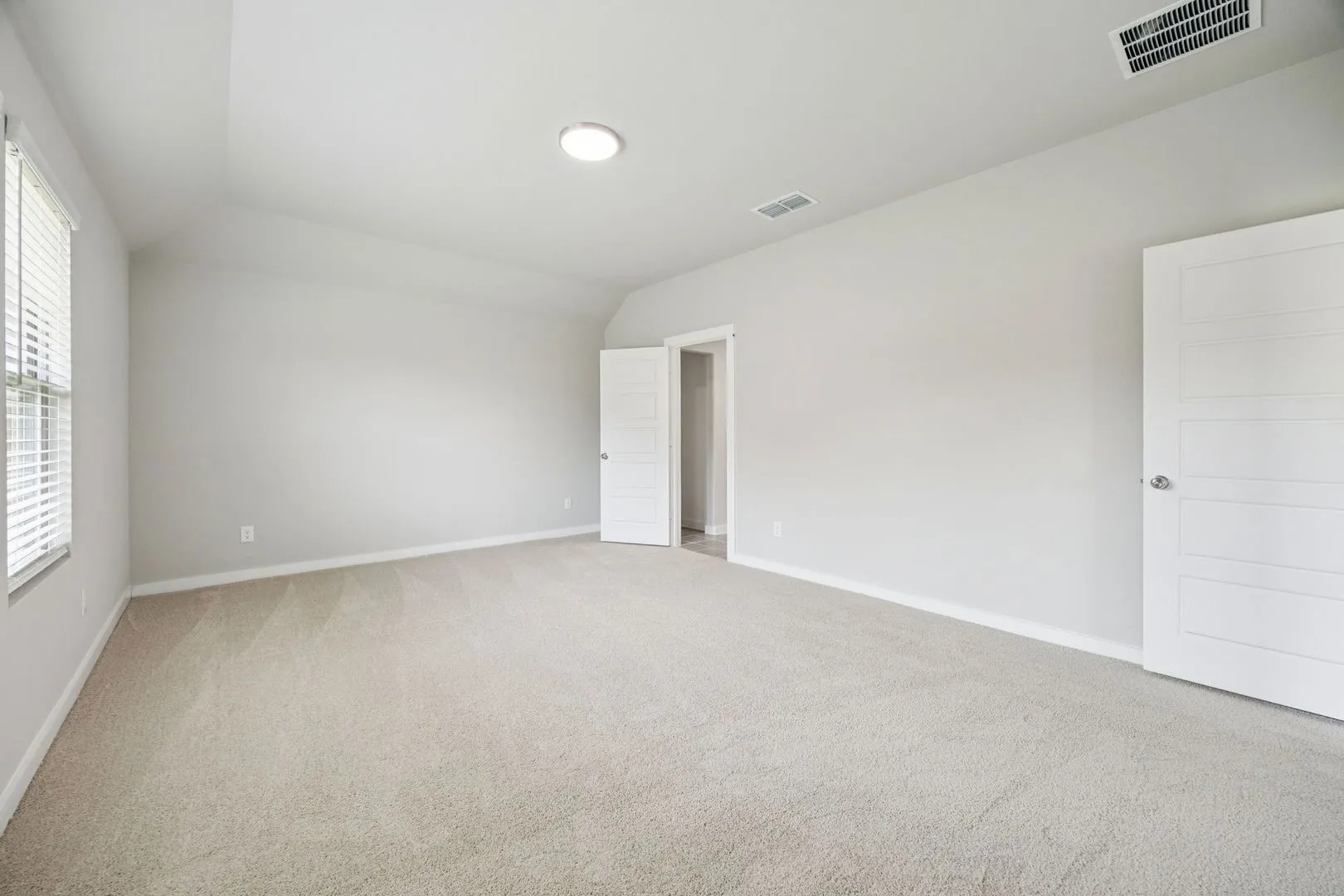 Primary Suite in the Hayden home plan by Trophy Signature Homes – REPRESENTATIVE PHOTO