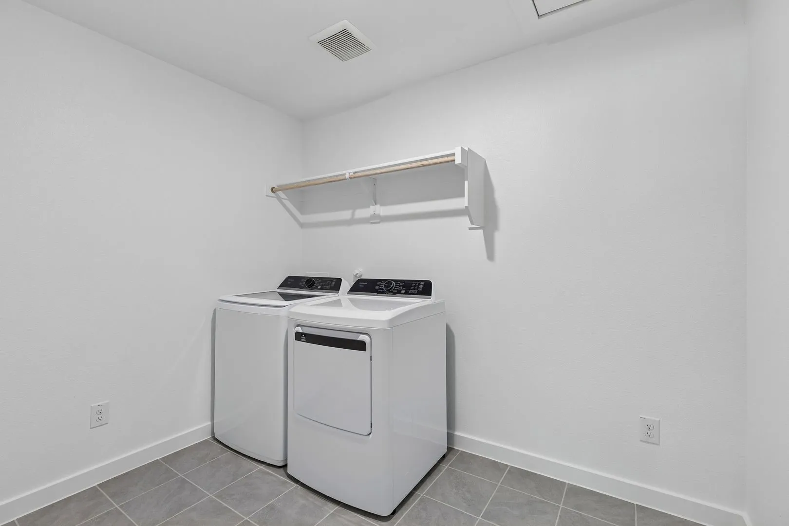 Utility Room in the Harrison home plan by Trophy Signature Homes – REPRESENTATIVE PHOTO
