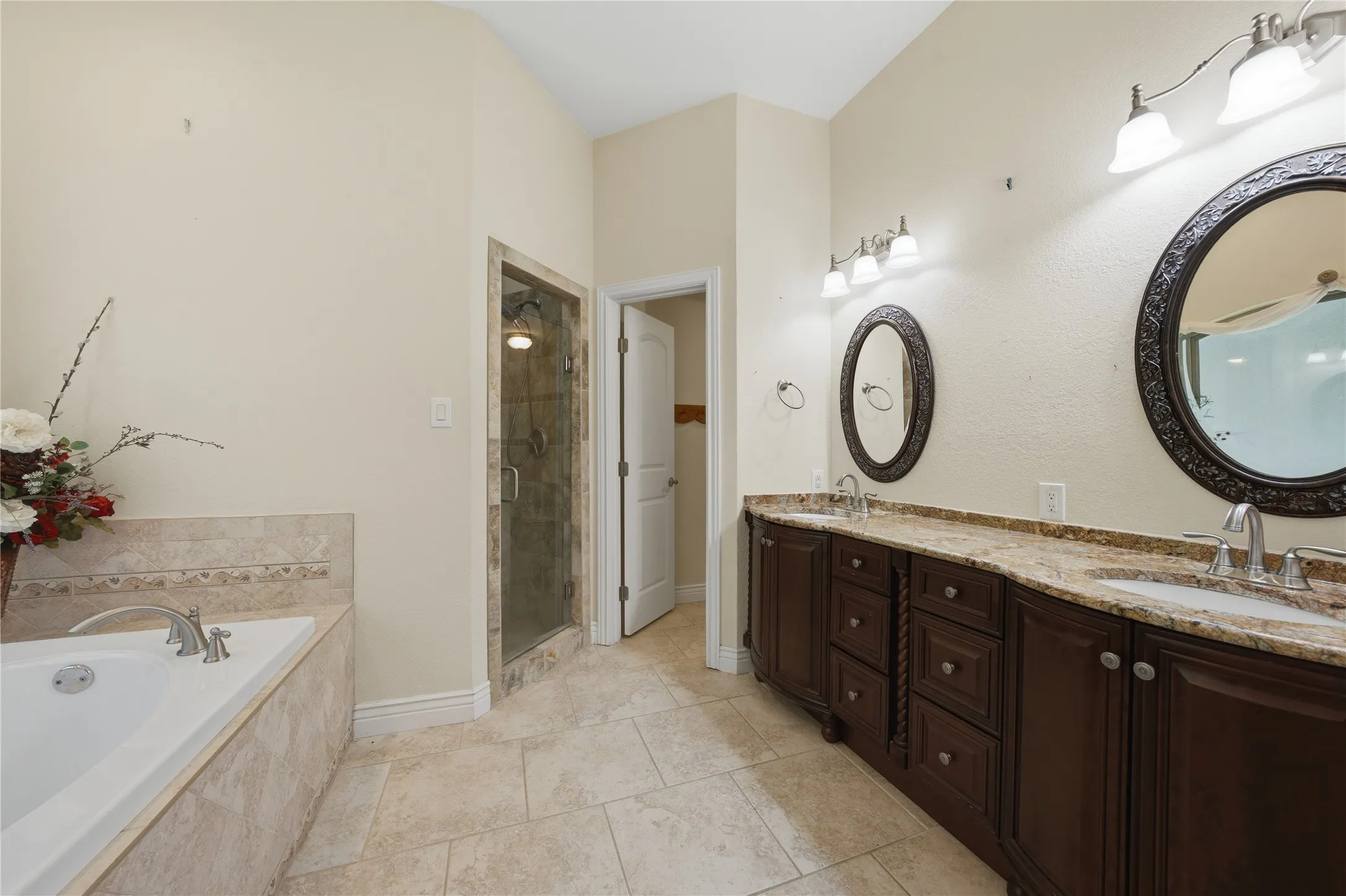 Master bath facing shower and private toilet