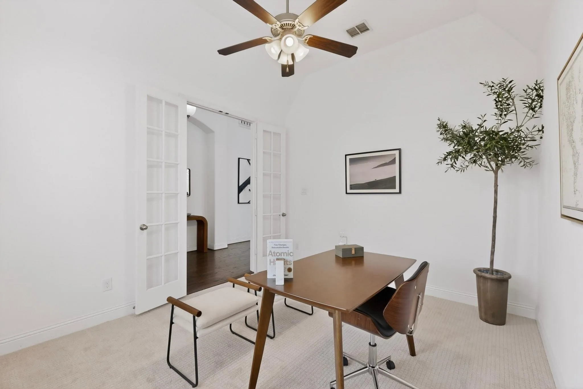 Bright office with a ceiling fan