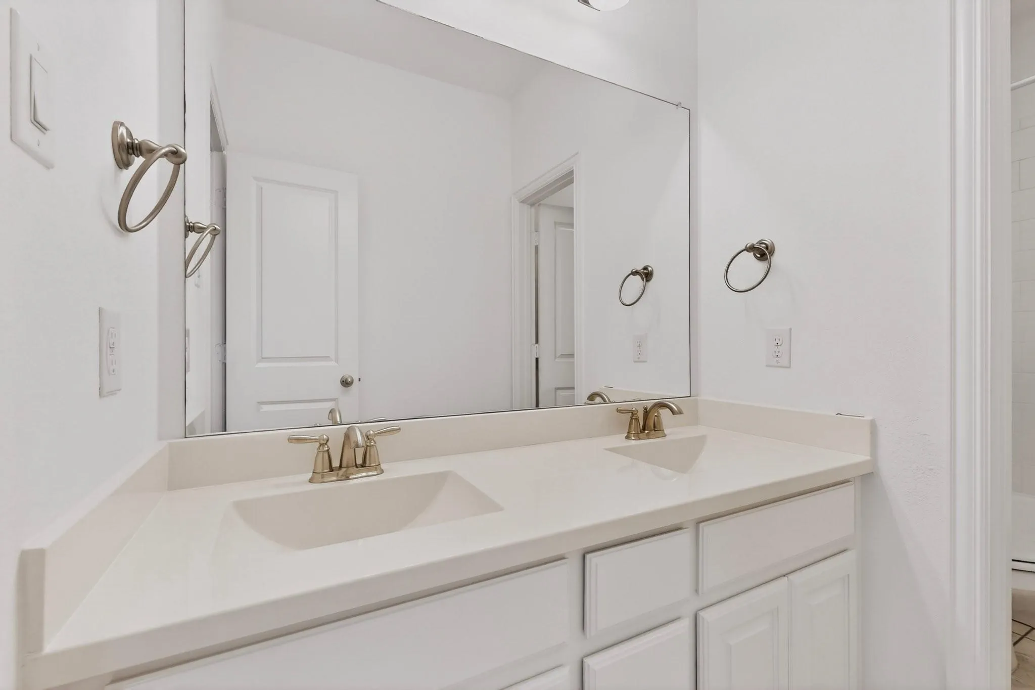 Bright bathroom with dual sinks