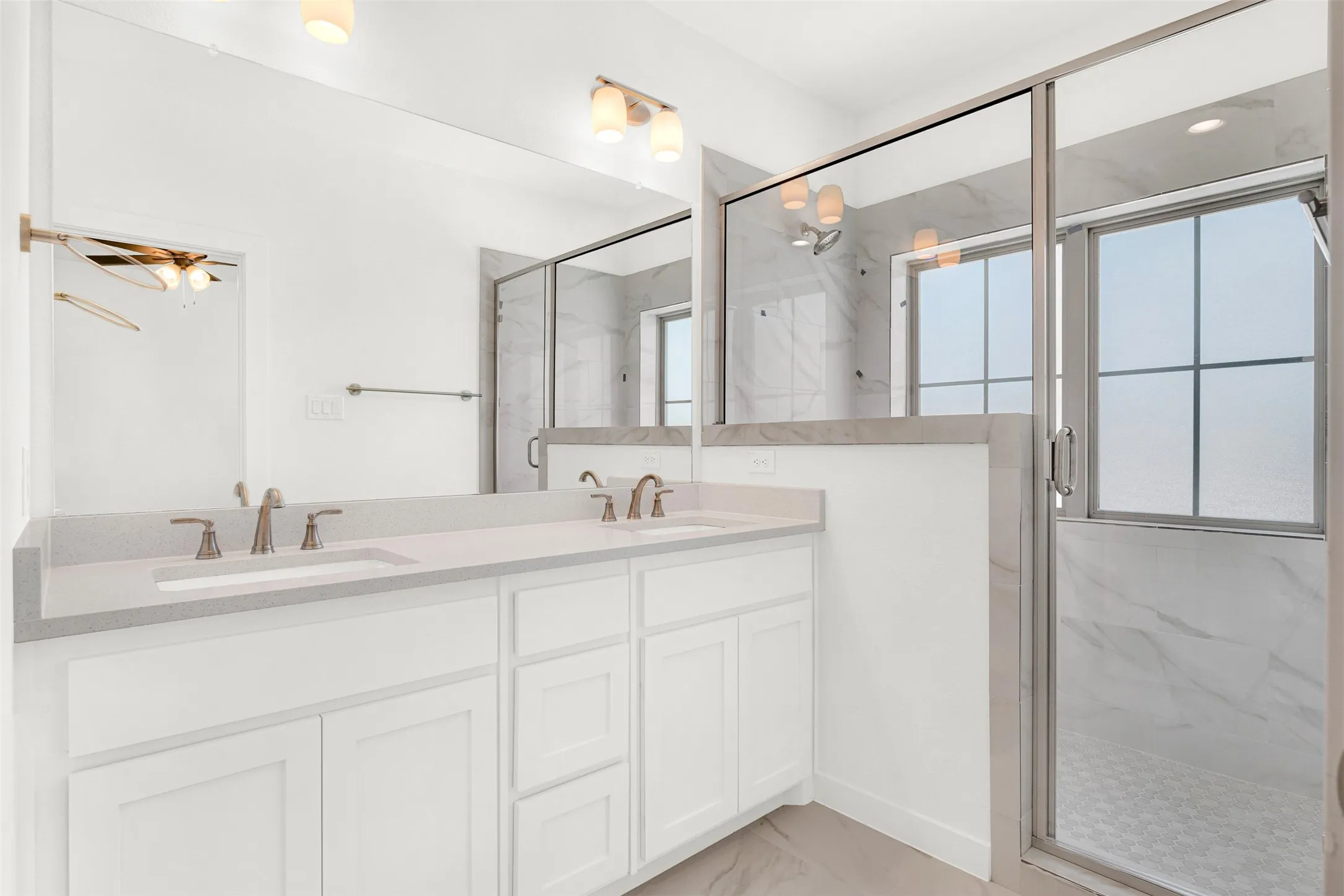 Master bedroom and bath are  on the second floor. Luxurious master bath with Double vanity has custom  granite countertops and a large, double walk-in shower.