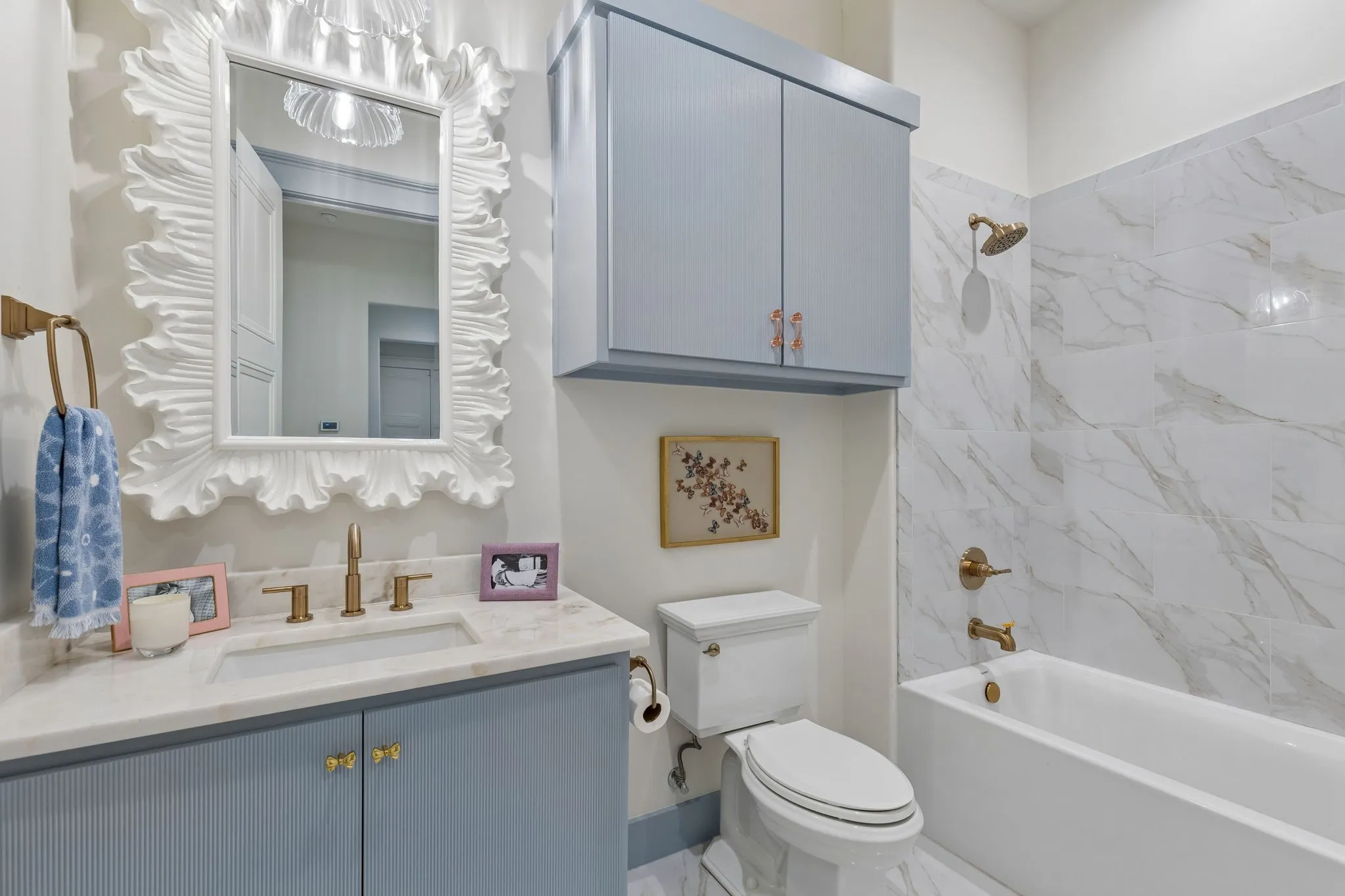 Beautifully designed bath for the secondary bedrooms