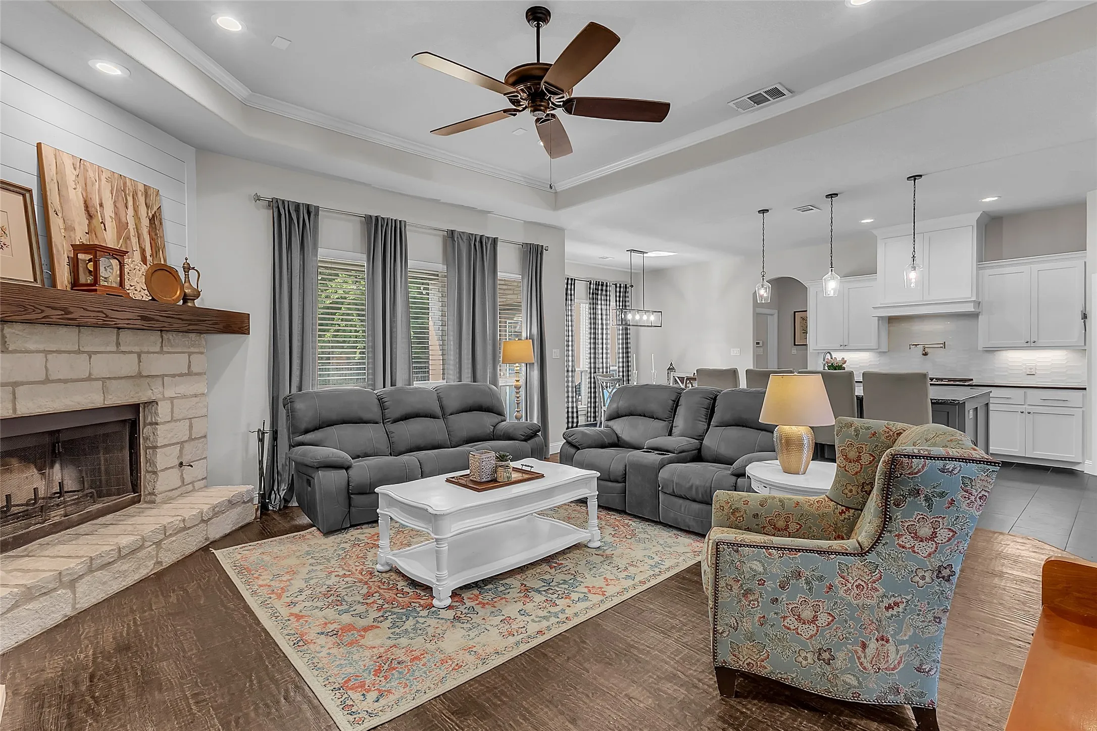 Open concept living area with dark wood-finish flooring
