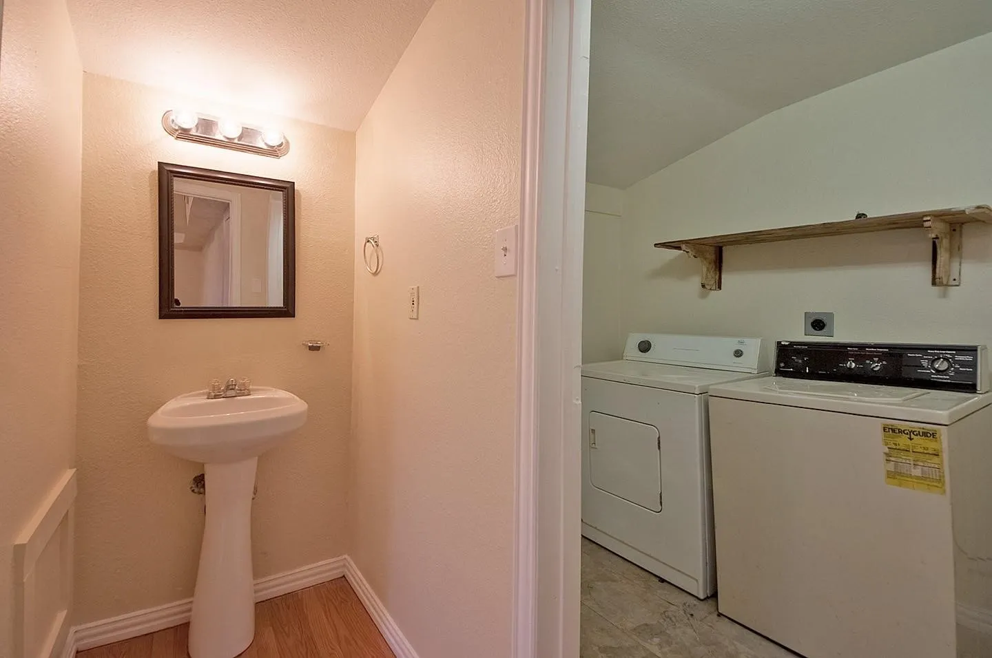 A separate utility room beside the bathroom