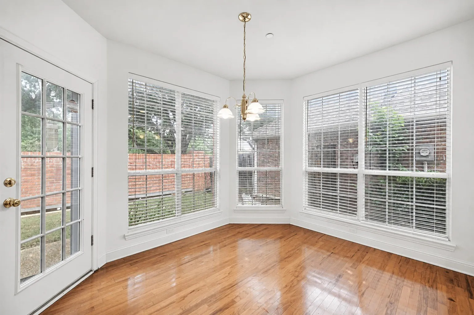 Wood-finish flooring with crisp white walls