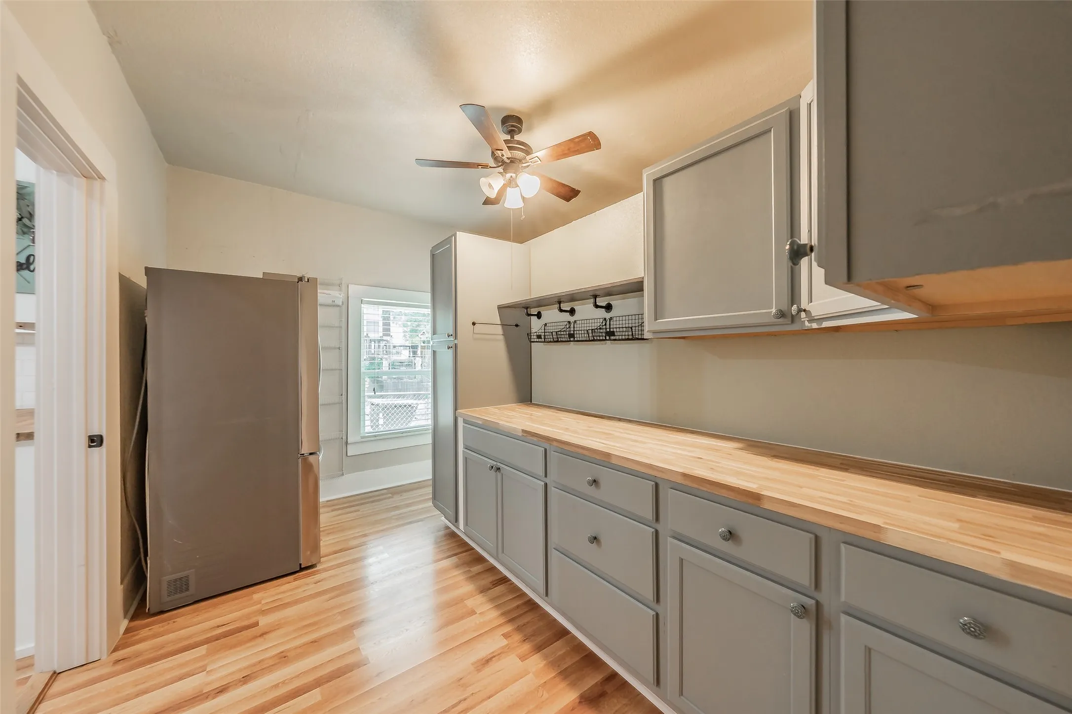 Large pantry with room for another refrigerator or freezer
