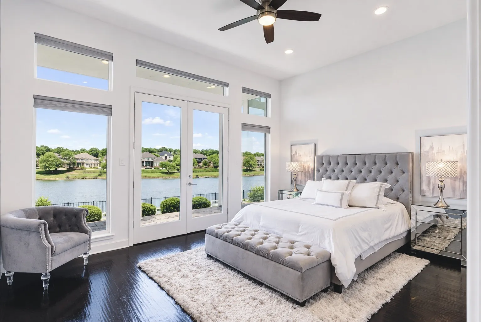 Beautiful bedroom with private patio access and direct entry to the pool area, creating a relaxing indoor-outdoor retreat.