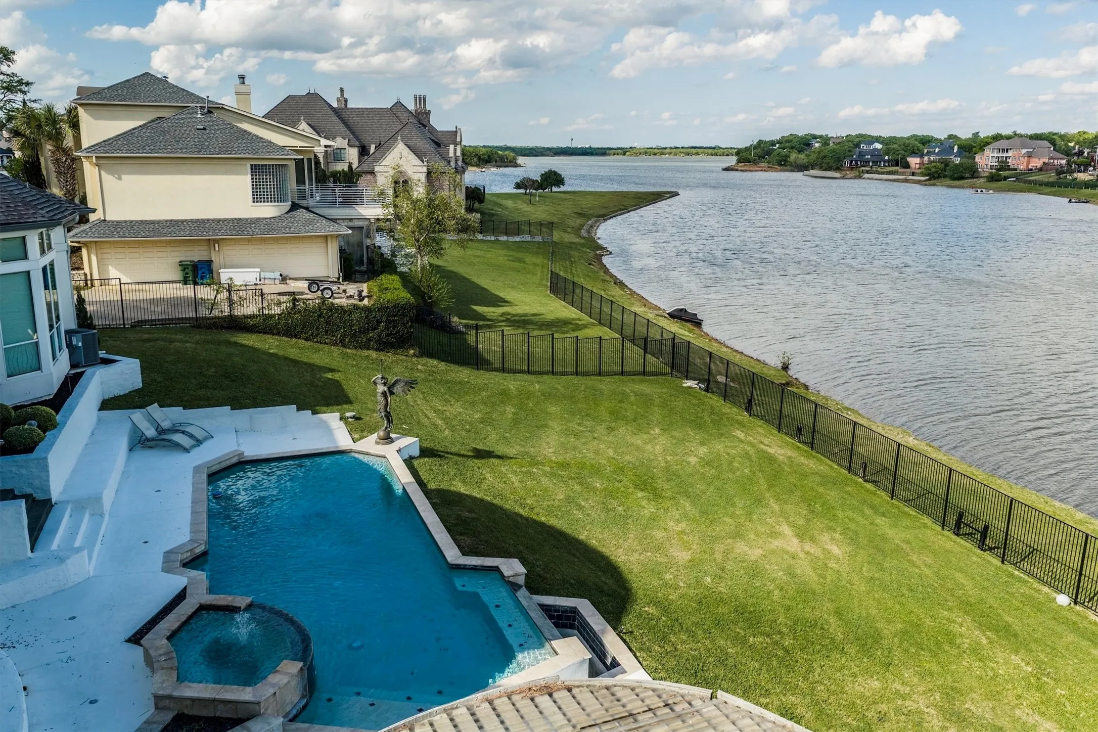 The pool enjoys ideal afternoon shade, thanks to the home's orientation, creating a comfortable retreat even on warm summer days!
