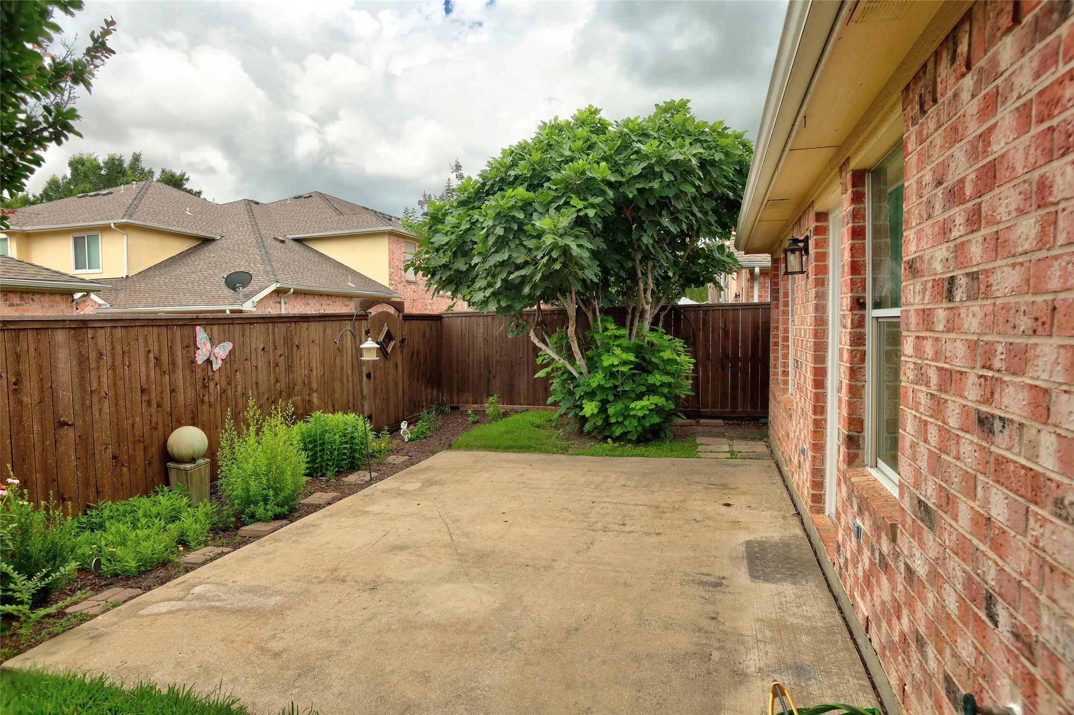 Open patio with nice landscaping