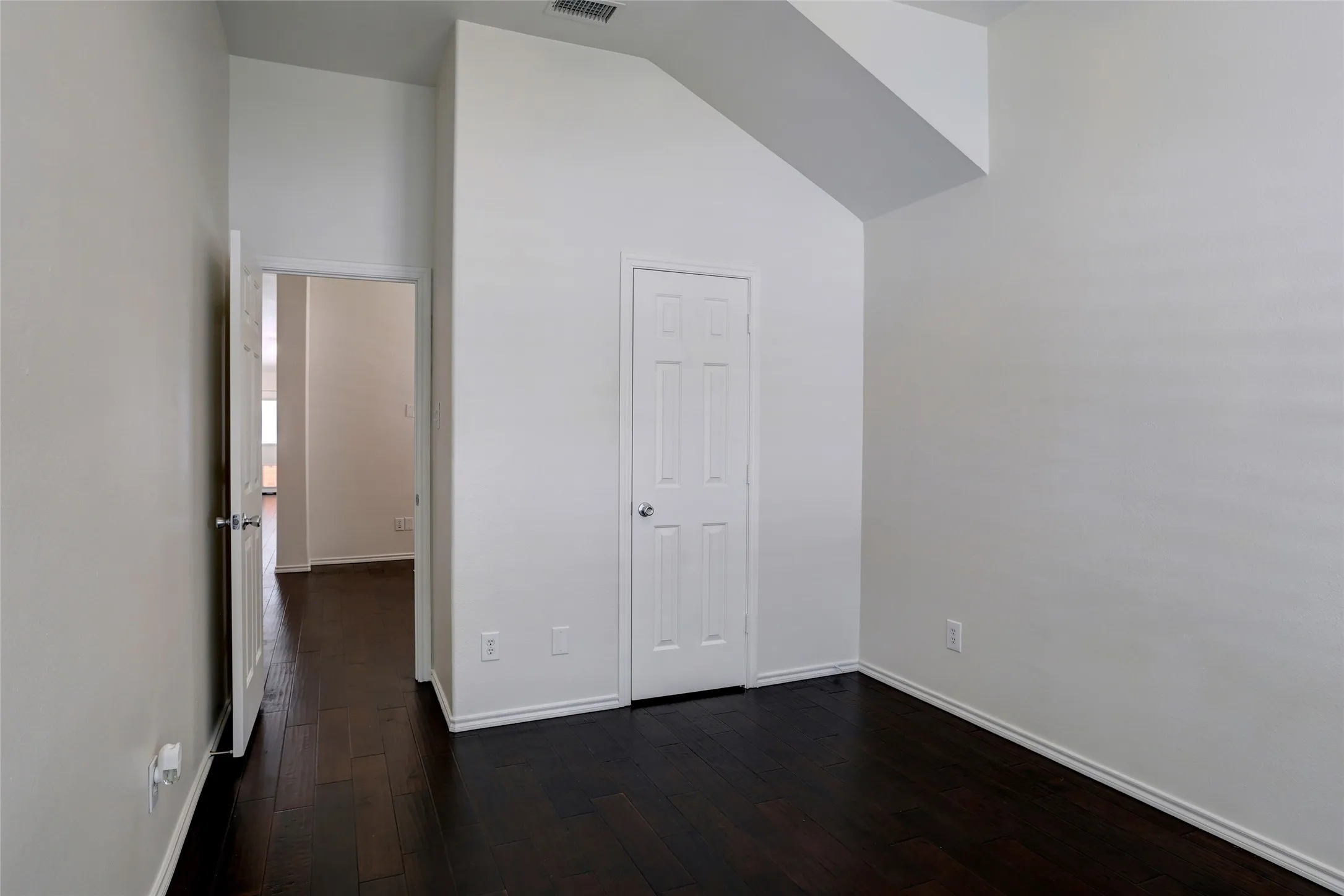 Secondary bedroom with walk in closet