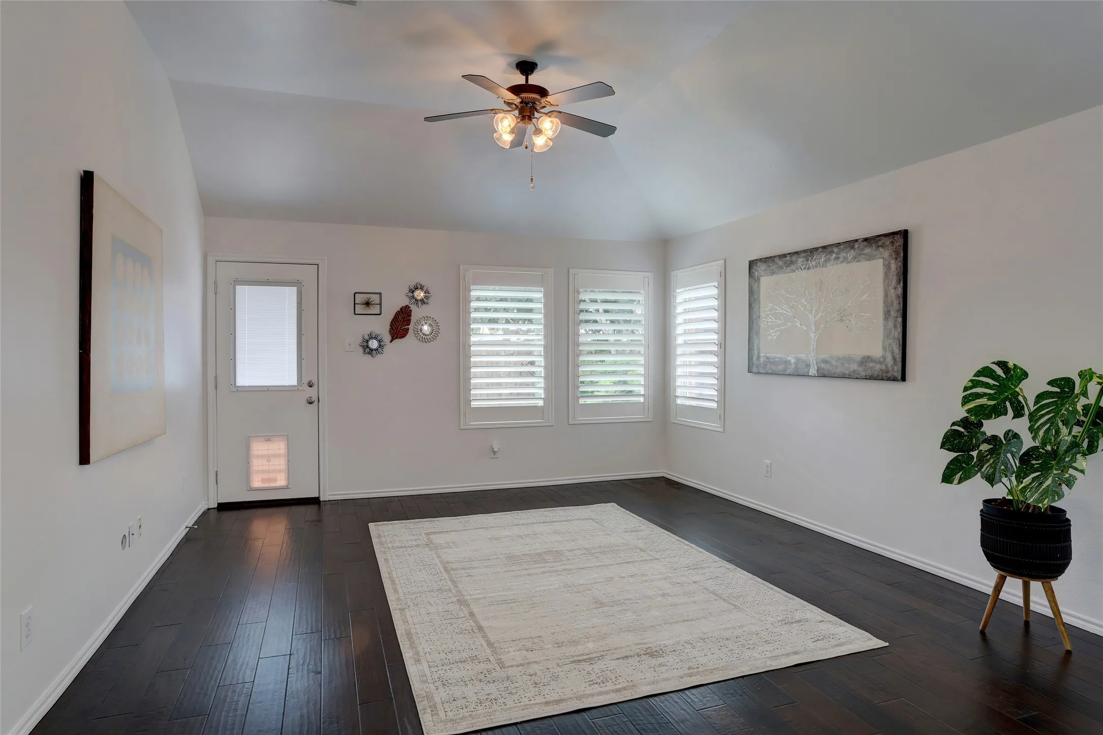 Nice size living room with engineered wood flooring and fresh paint