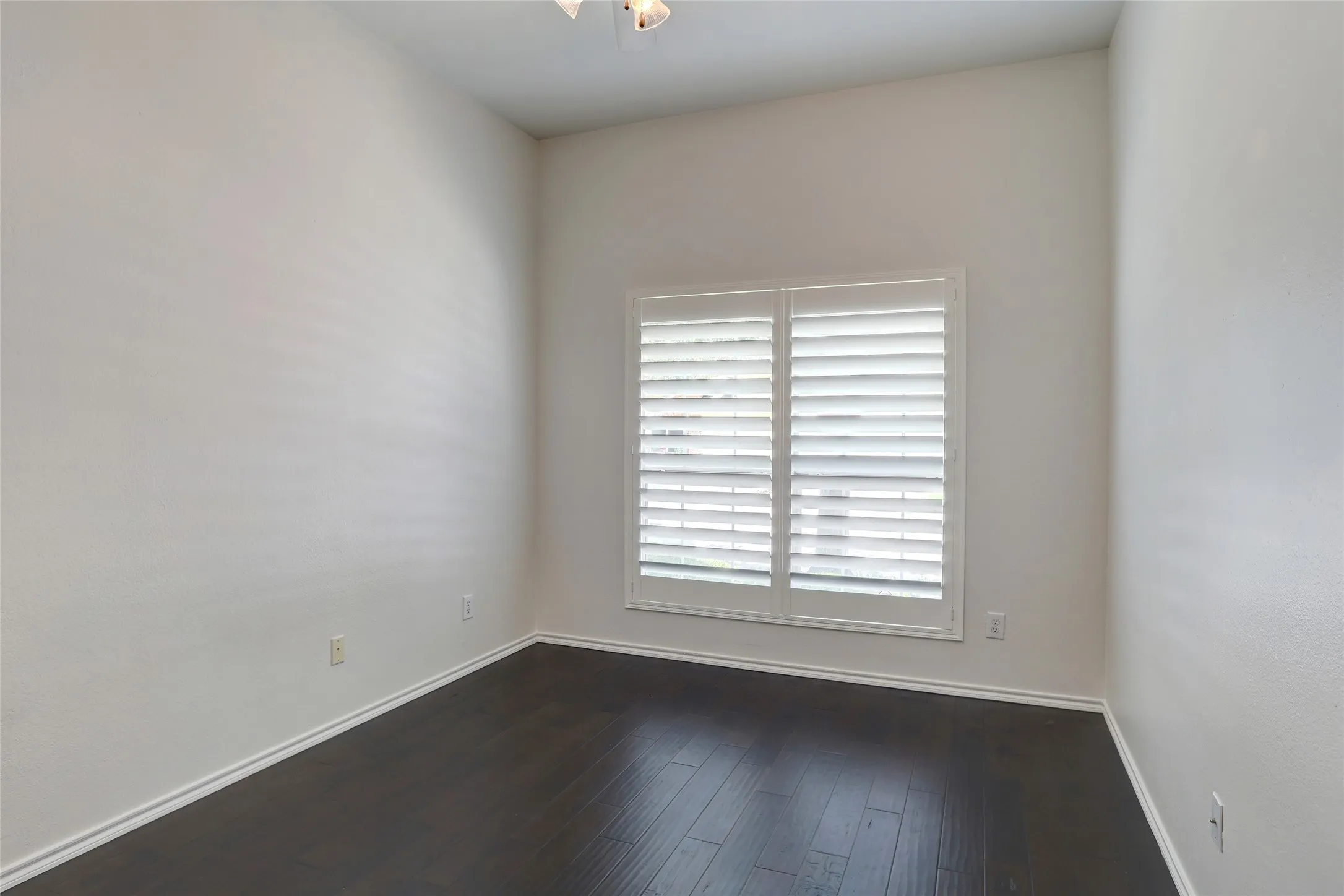 Nice size secondary bedroom space with tall ceilings