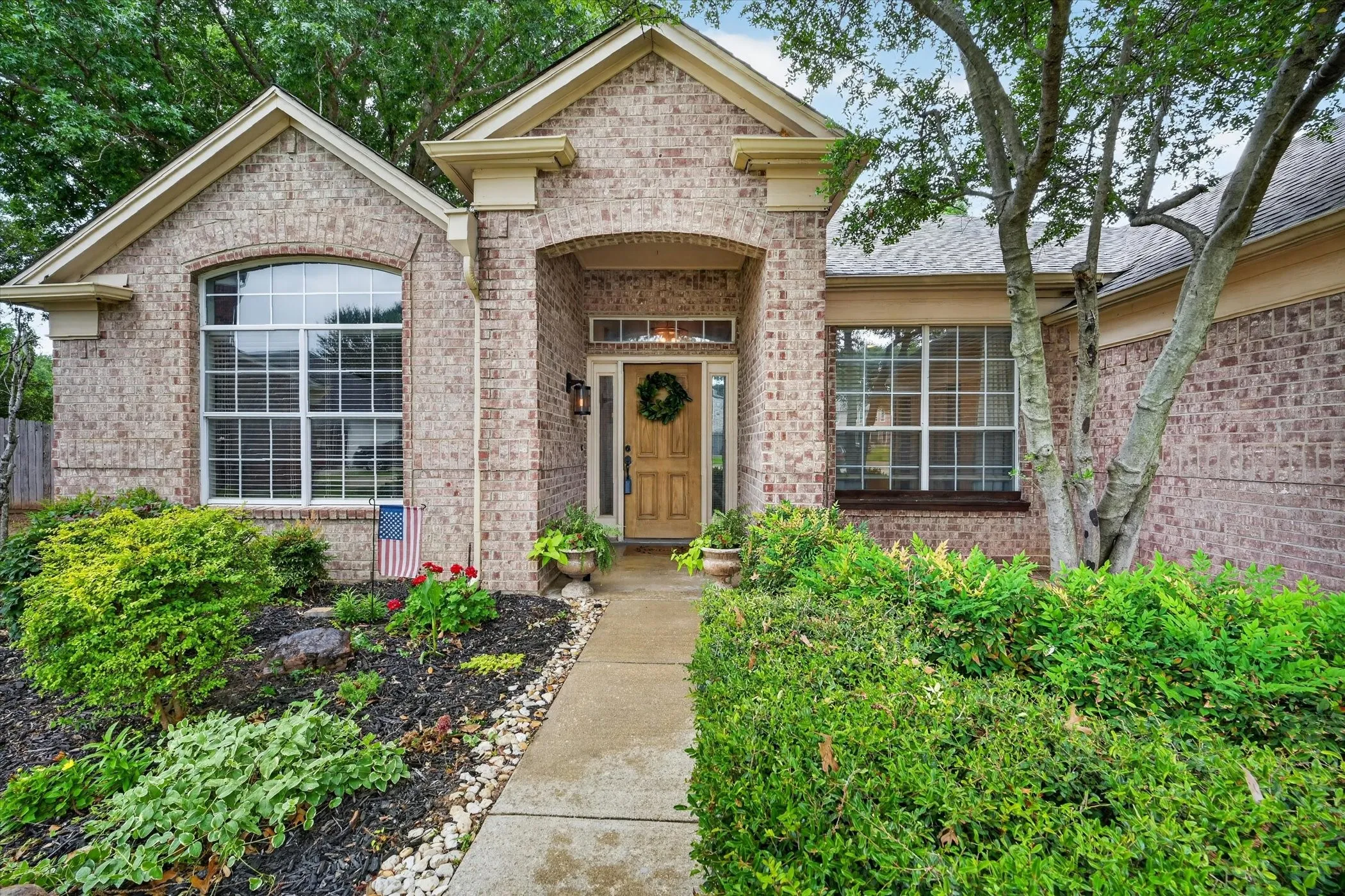 Brick exterior with arched entry