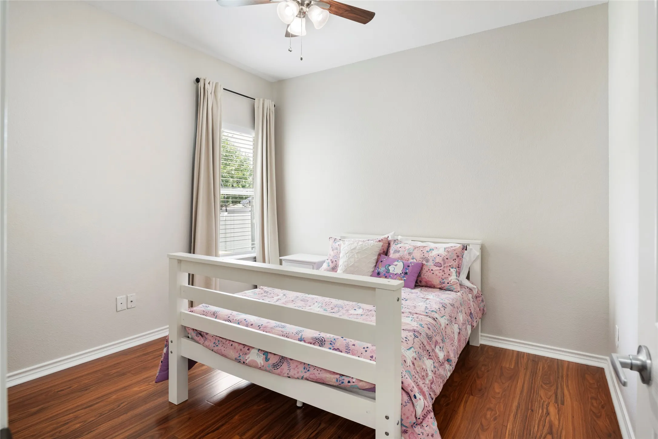 Downstairs bedroom and full bath provide excellent flexibility for guests, a home office, or multi-generational living.