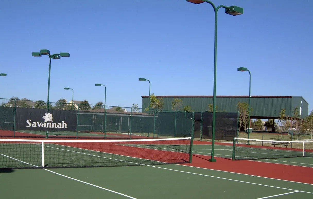 This 2,500-home community has four tennis courts; baseball, basketball, & multiple soccer fields; lakes, miles of walking trails, & sand volleyball.