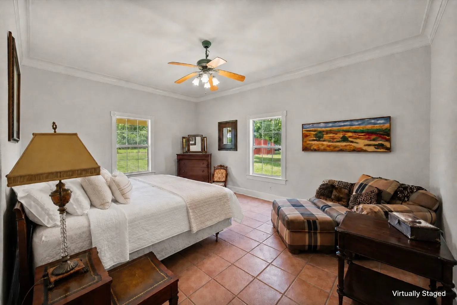 Primary bedroom with fresh farmhouse bedding in a 3-bedroom home on 42 acres near Dallas.