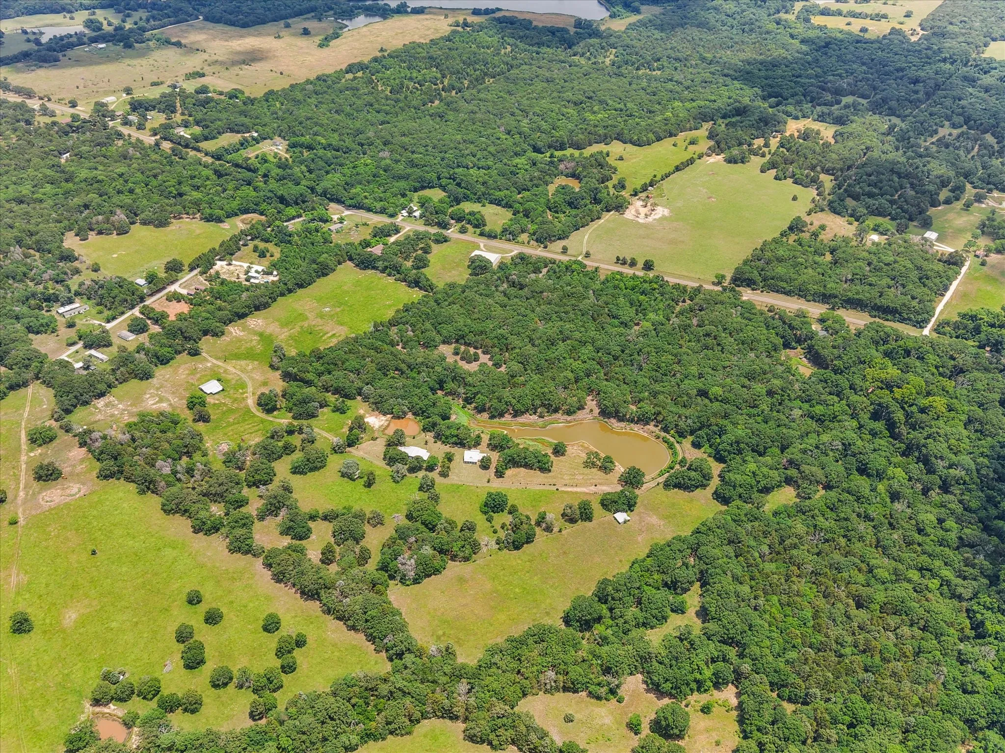Productive coastal hayfield offers annual income potential on this 42-acre Kerens farm and ranch property near Corsicana and Dallas.