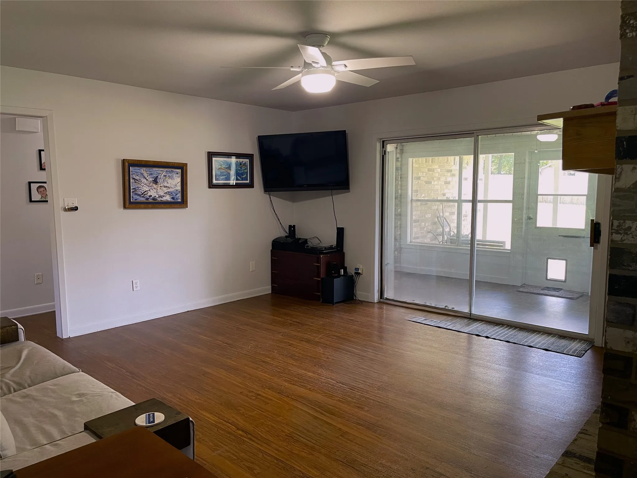 Sliding glass doors to enclosed patio