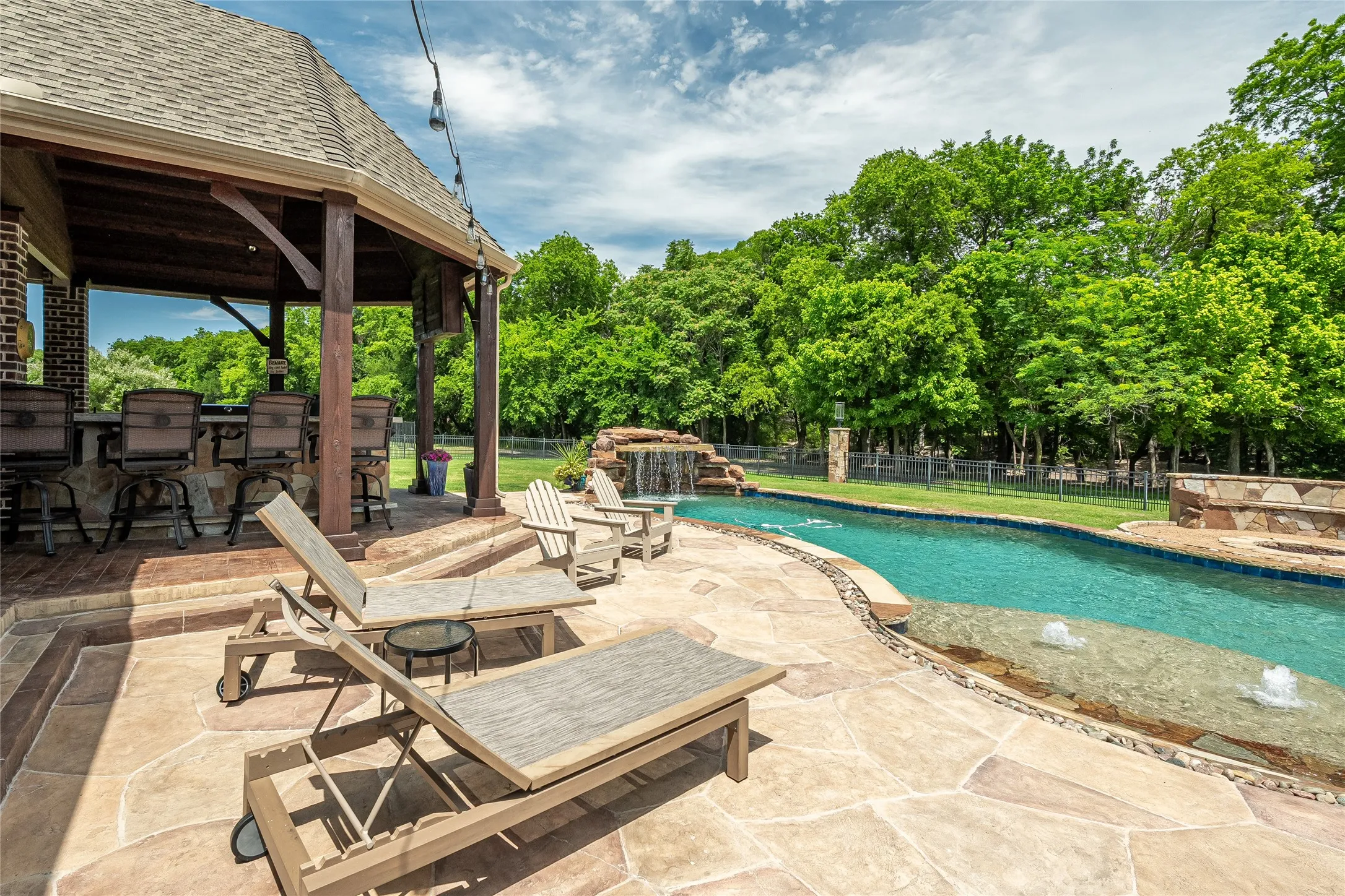 pool and outdoor kitchen.
