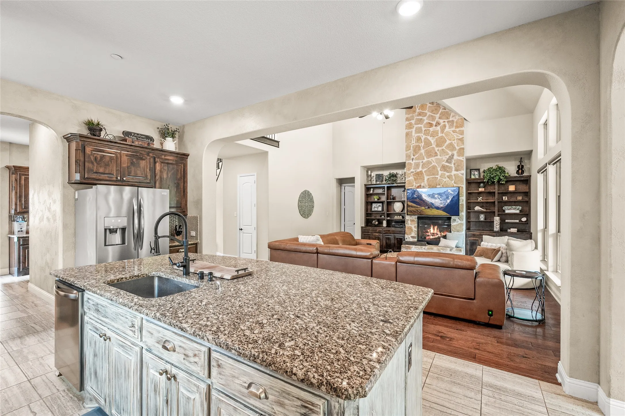 Open concept kitchen and living area with large kitchen island