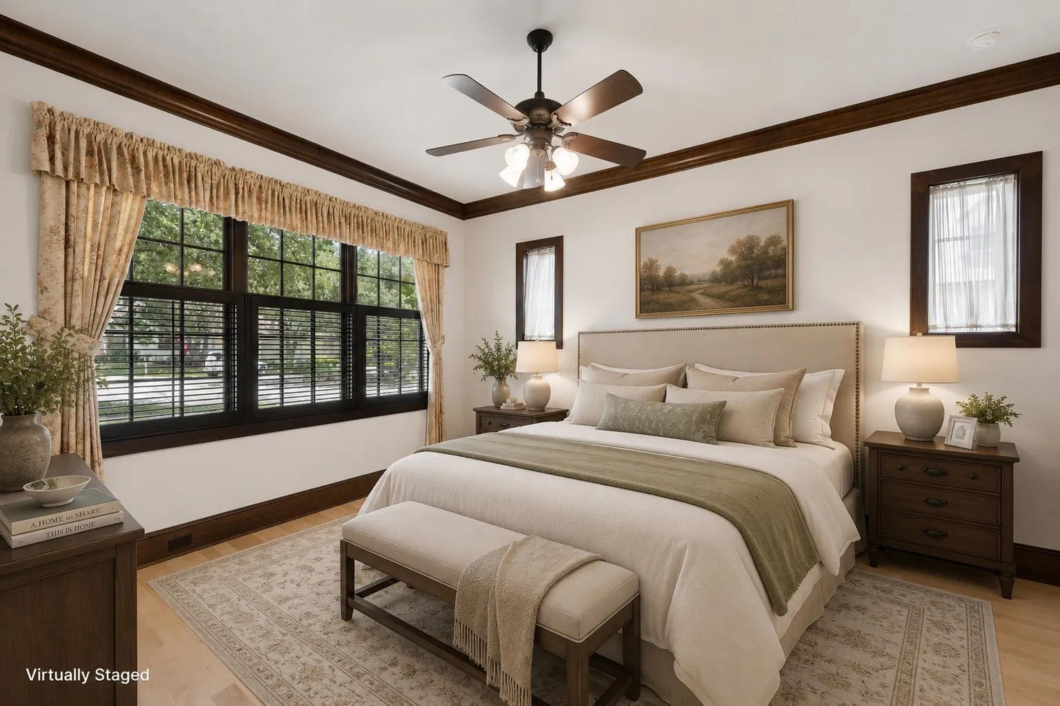 First floor guest suite. Hardwood flooring complemented by dark wood trim and crown molding