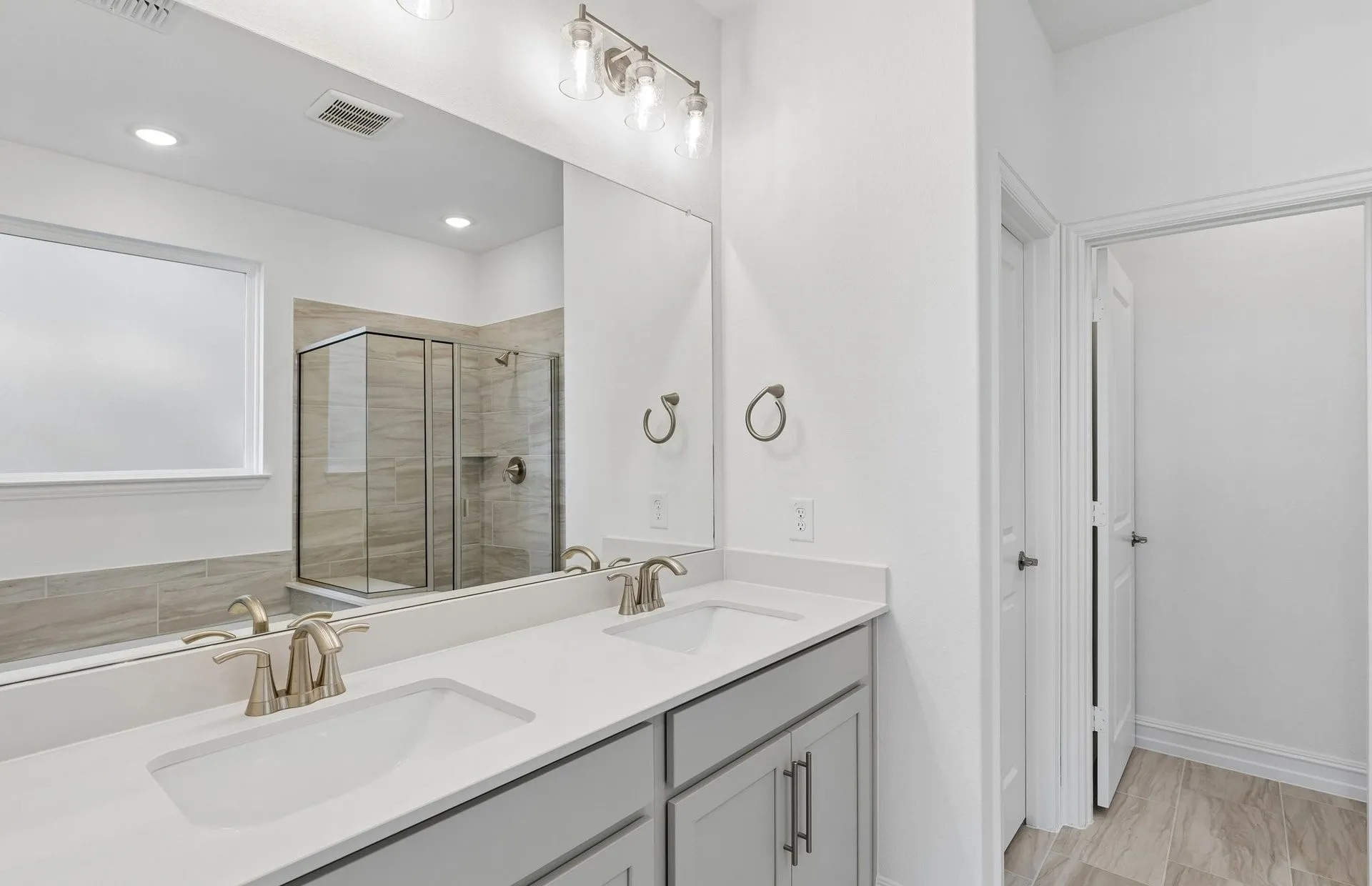 Double vanity in owners bath