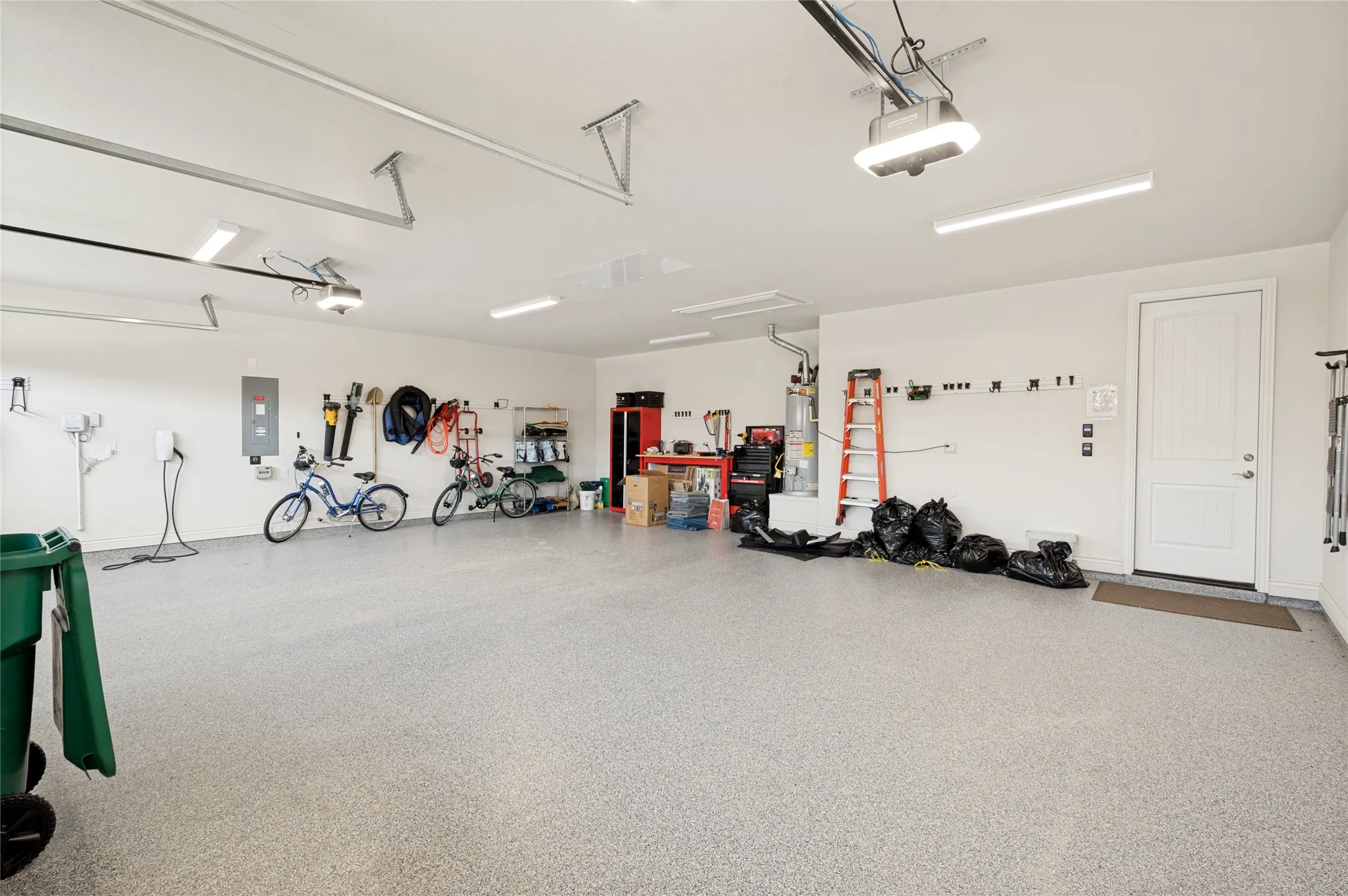 Oversized 3 car garage-Telsa charger has been removed.