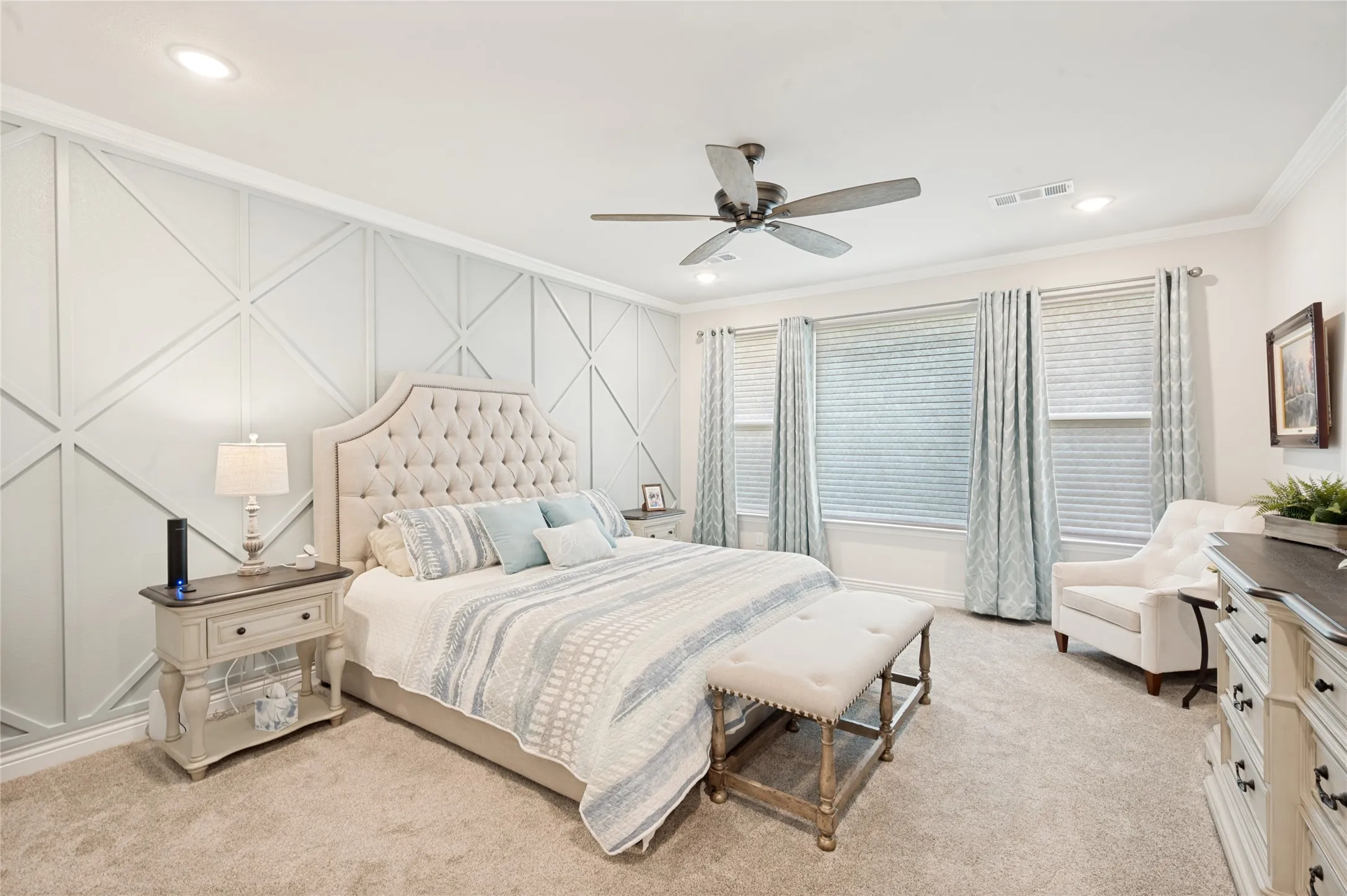 Primary Suite with a stunning custom feature wall!