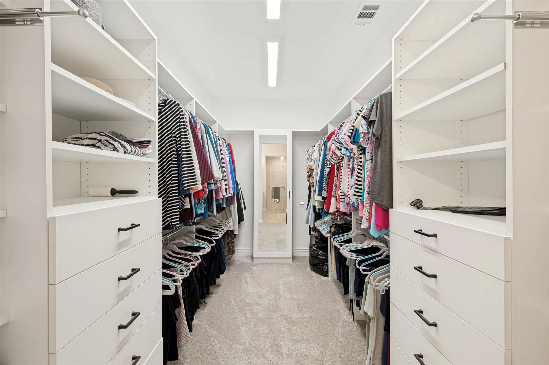 One of the 2 Primary Bedroom Walk in Closets.