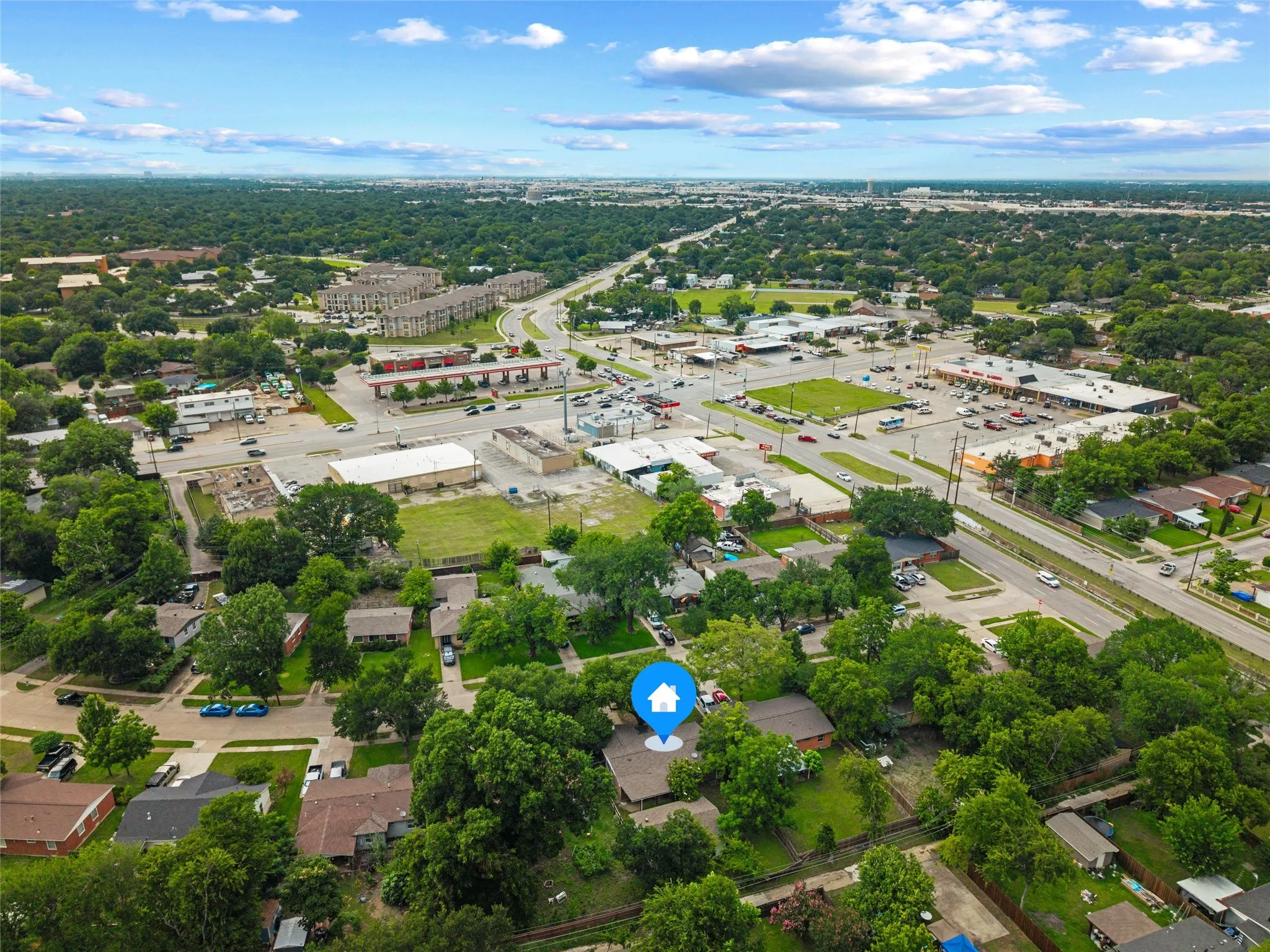 Aerial view of the surrounding neighborhood.