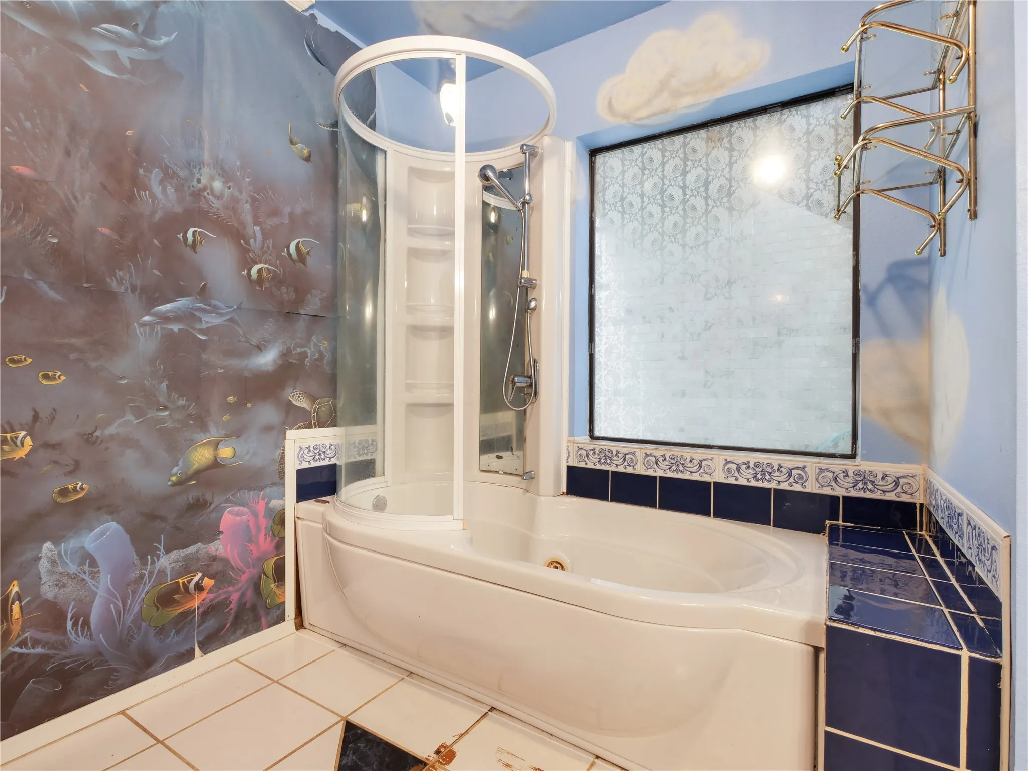 Bathroom featuring a built-in corner tub and an integrated shower enclosure