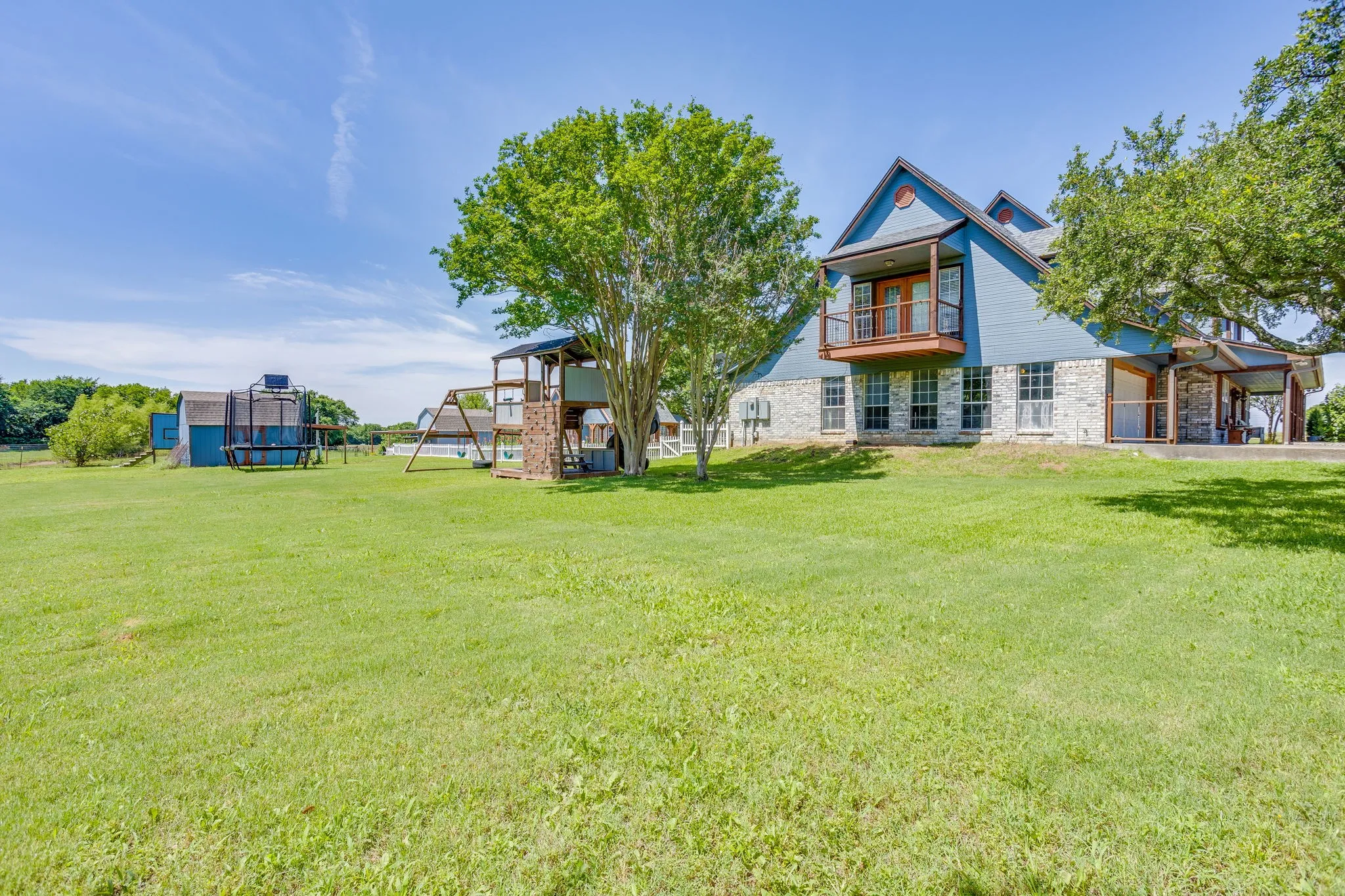 Large side yard view.