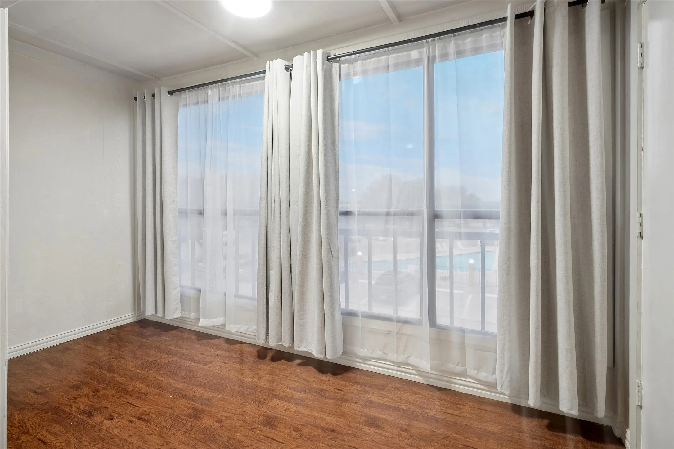 Bonus room for home office and hobbies. Views the community pool.