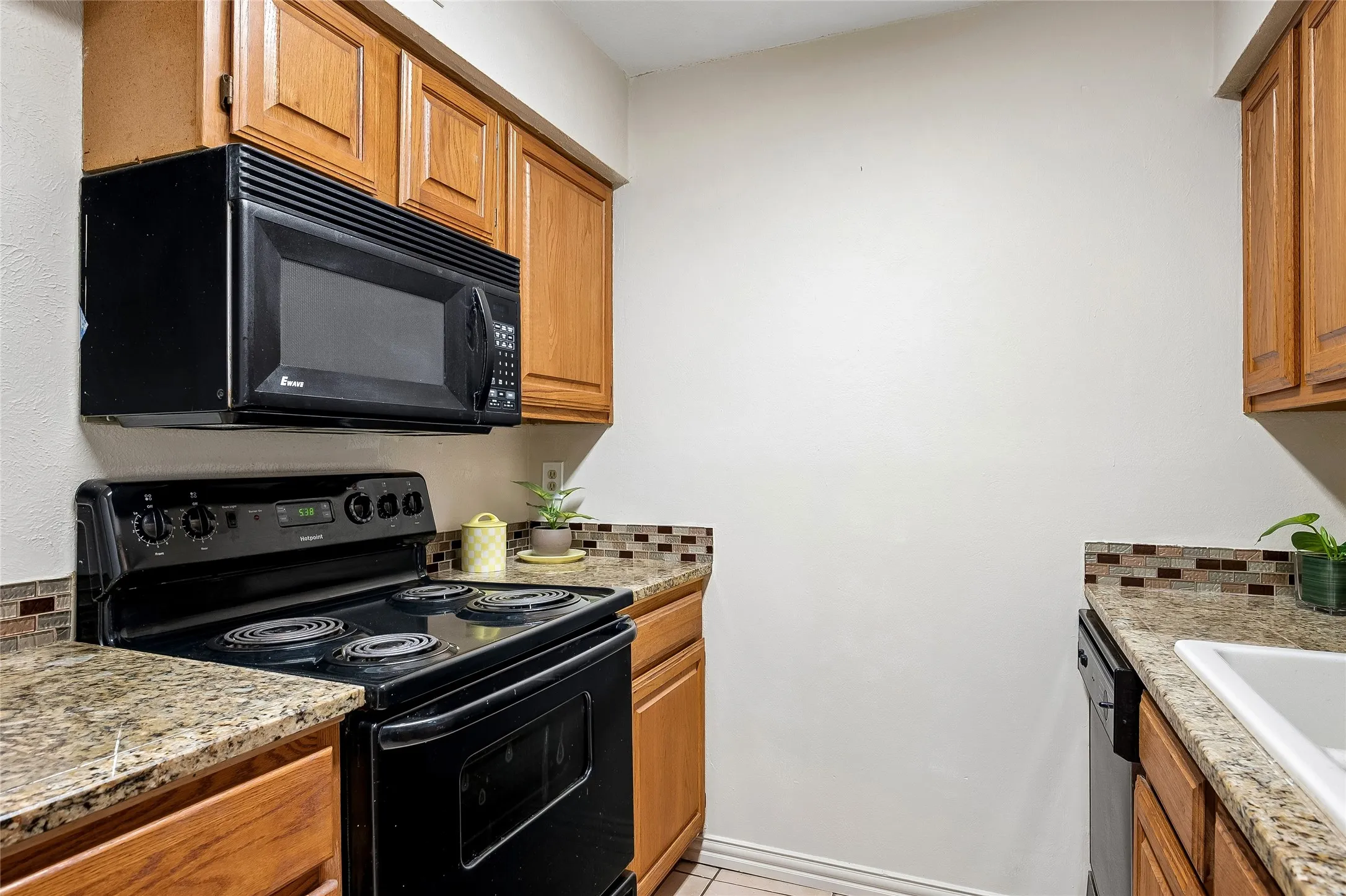 Nice refrigerator (not pictured) will remain with the condo