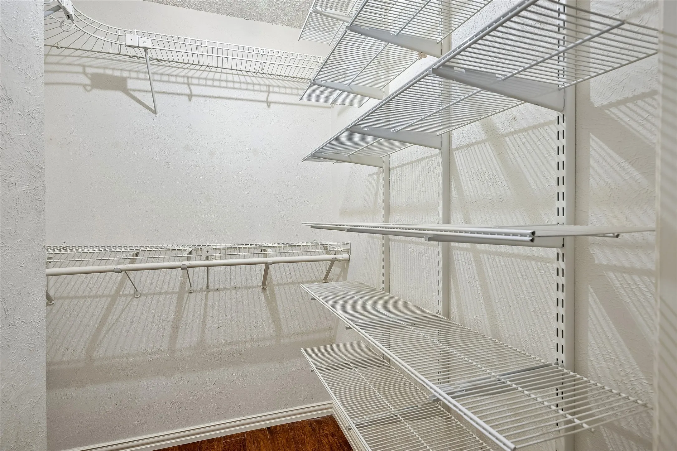 Primary walk-in closet.
