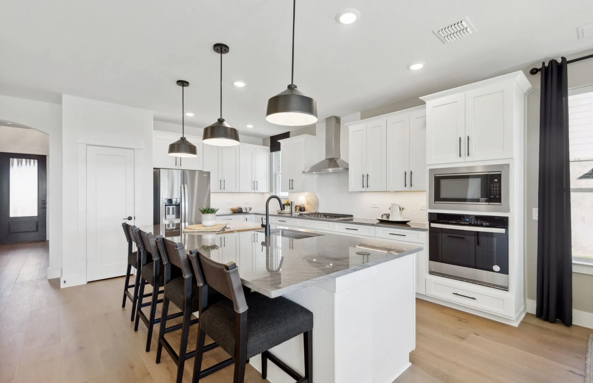 *Model Representation - Spacious kitchen with eat-in bartop island