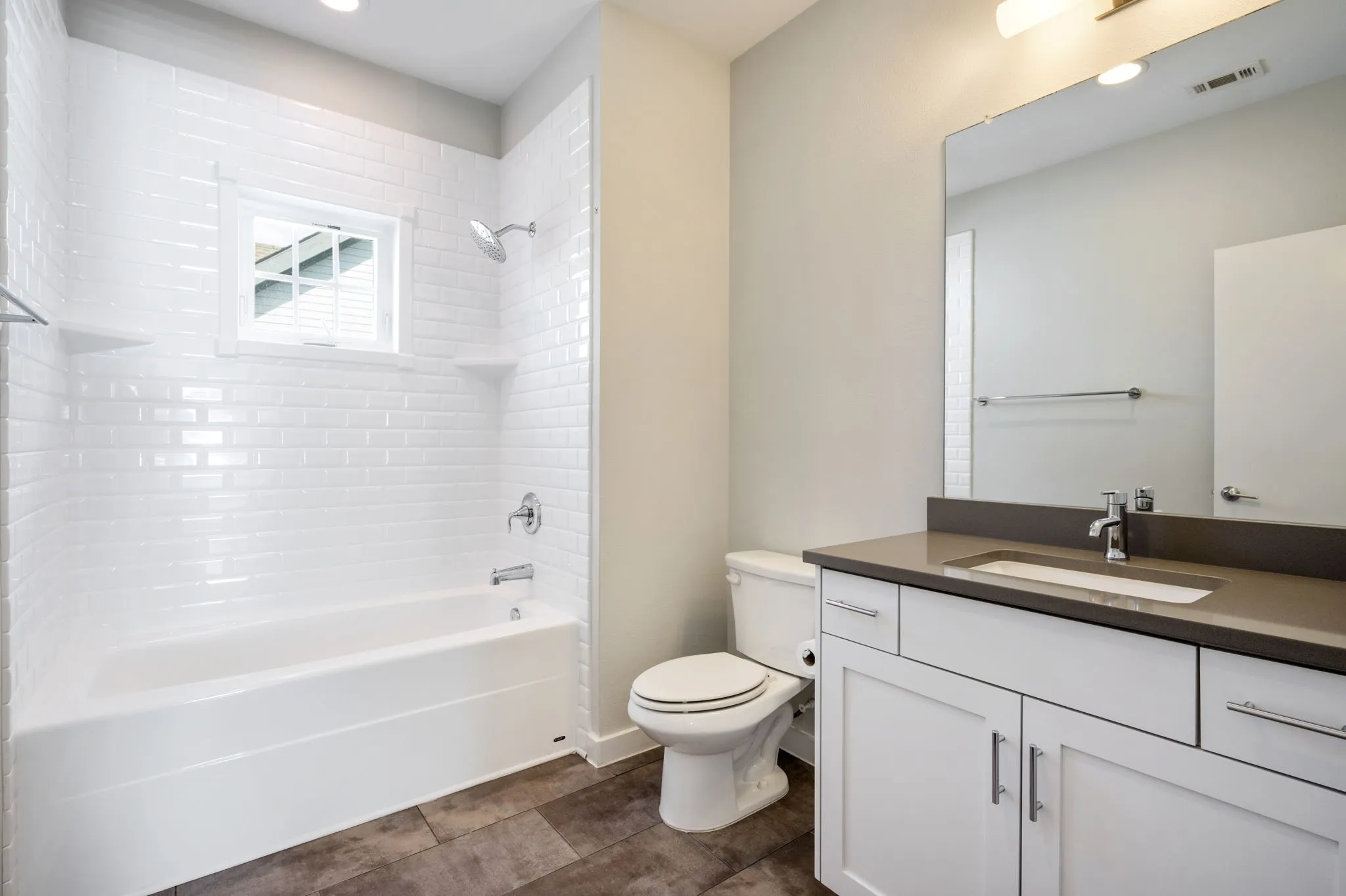  Spacious secondary bath with clean contemporary finishes.