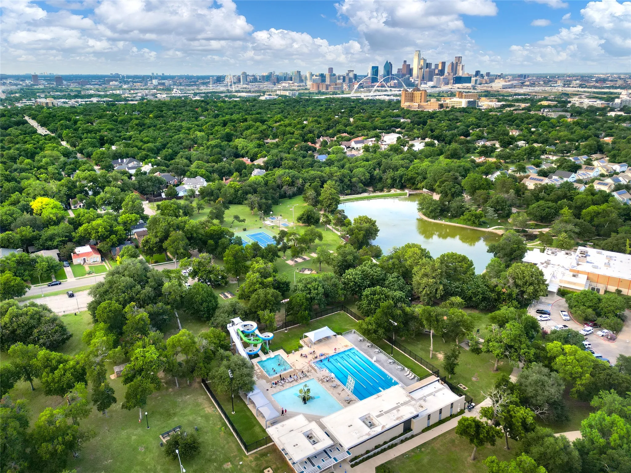 Kidd Springs Park features a recreation center, tennis courts, basketball courts, playgrounds, walking trails, picnic areas, and a community pool with water slides.