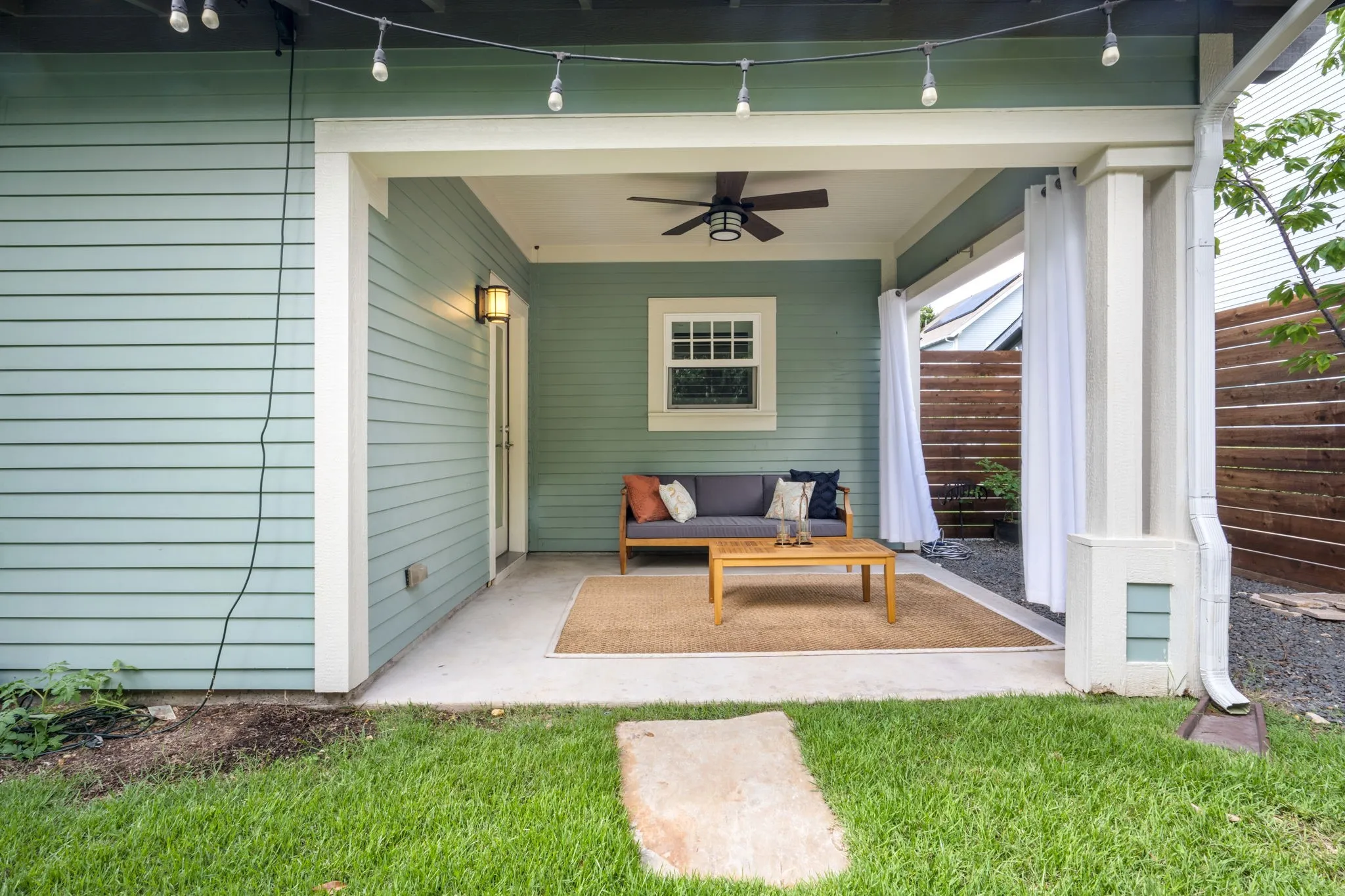     Spacious covered patio seamlessly connecting indoor and outdoor living.